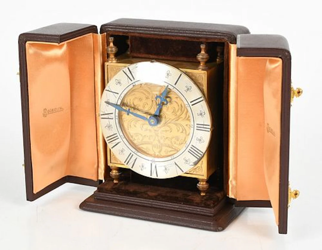 A Swiss Gilt Brass Table Clock by Guebelin
