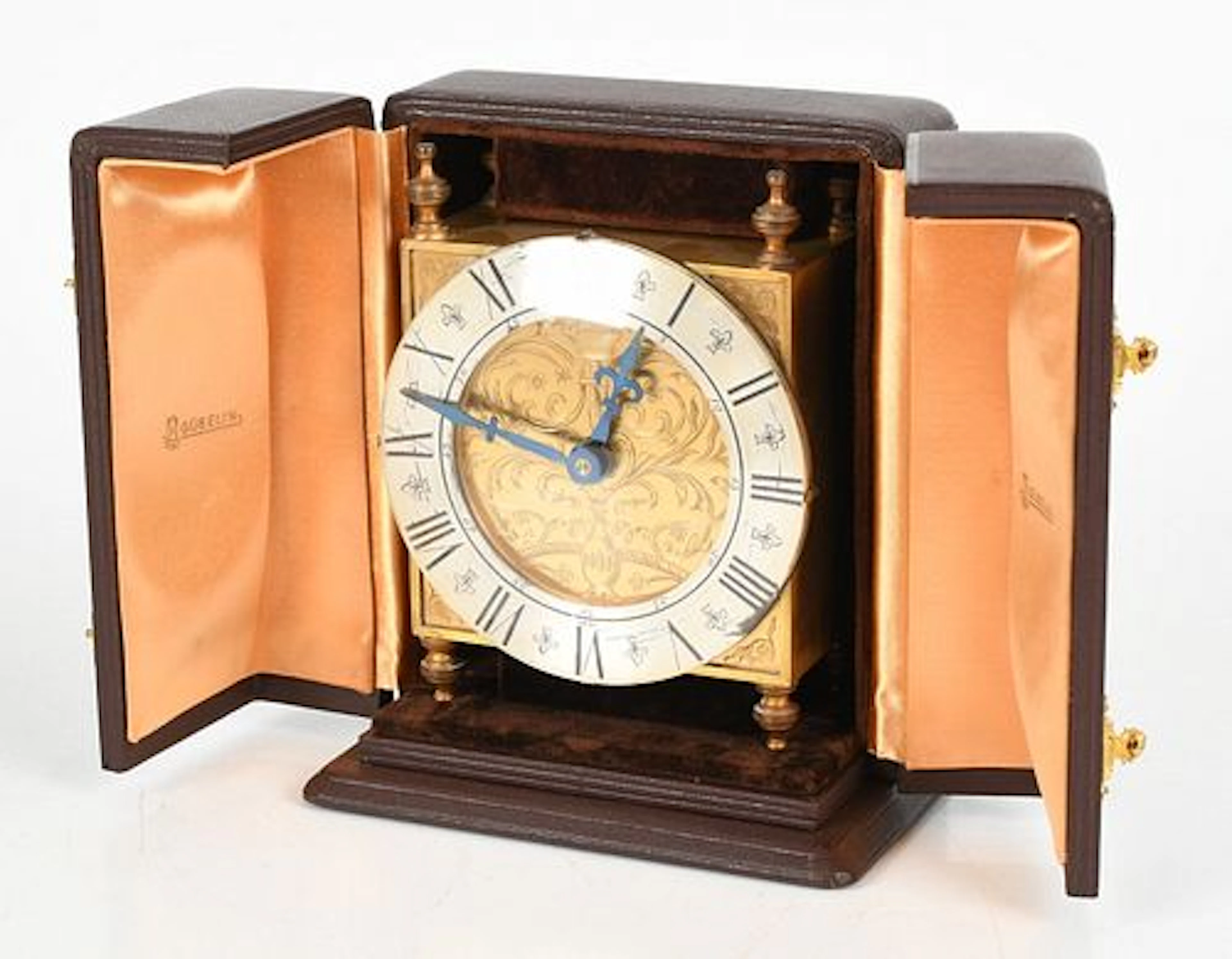 A Swiss Gilt Brass Table Clock by Guebelin