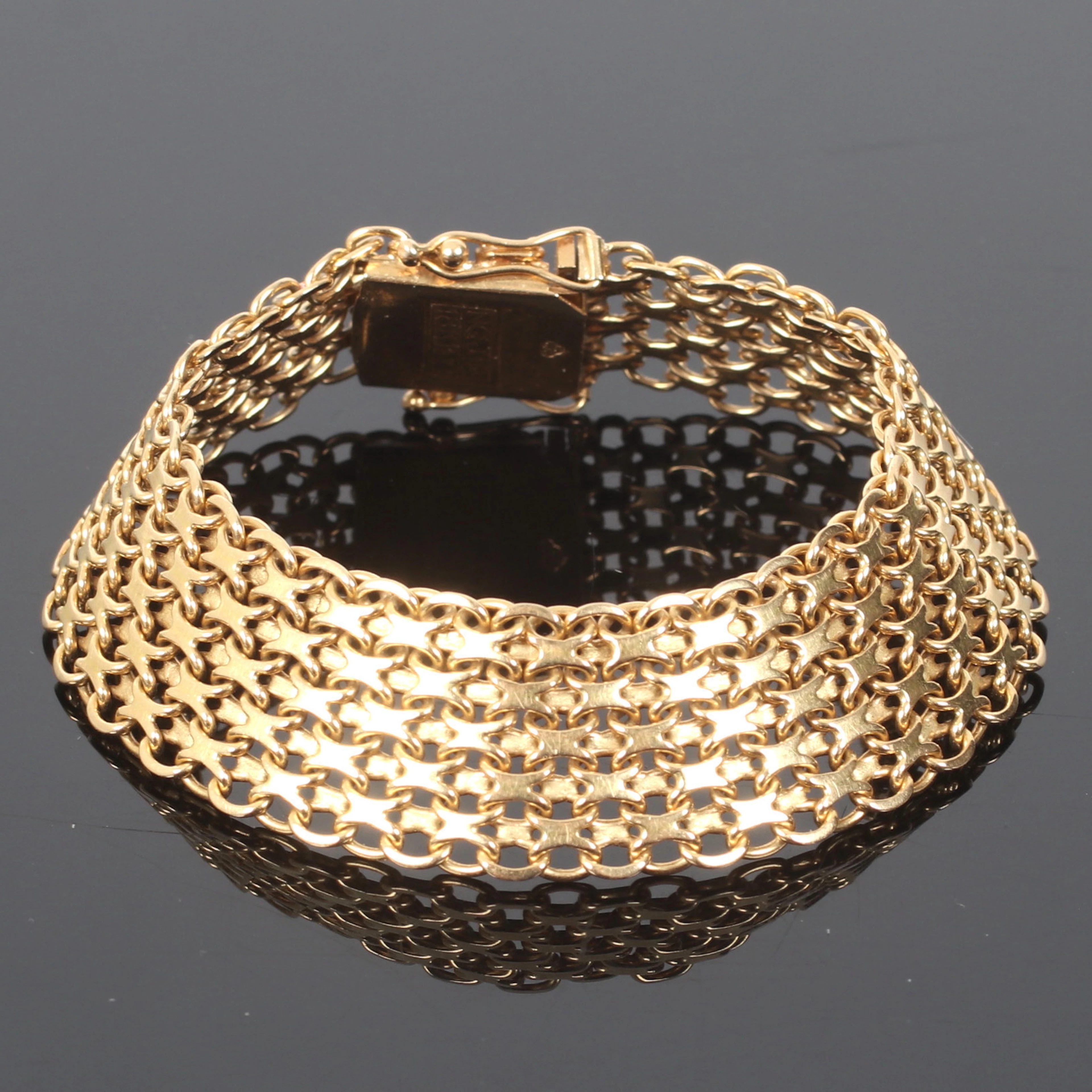 ARMBAND, 18k guld, treradigt, x-länk.