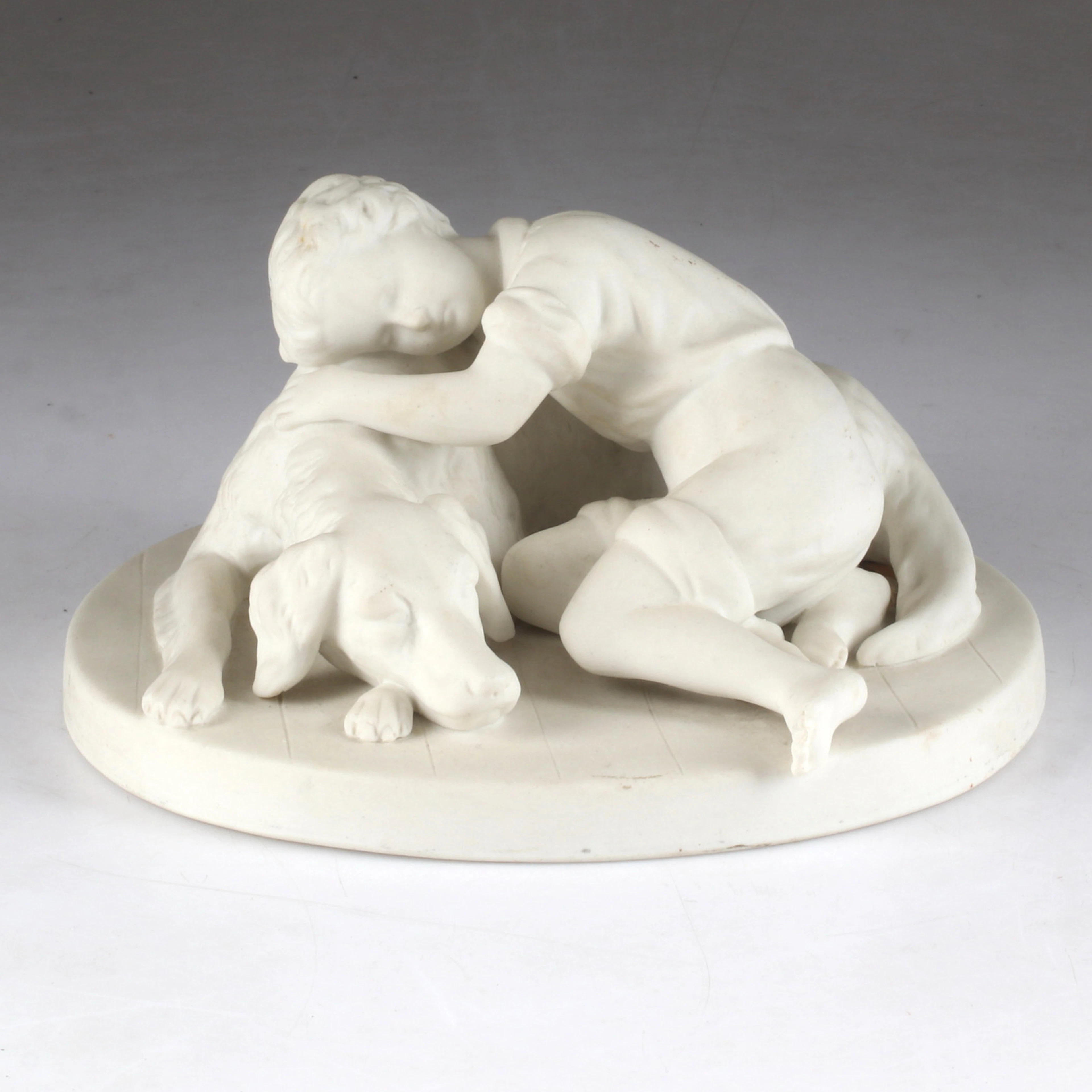 FIGURIN, pojke med hund, Parian, Gustavsberg, 1896.