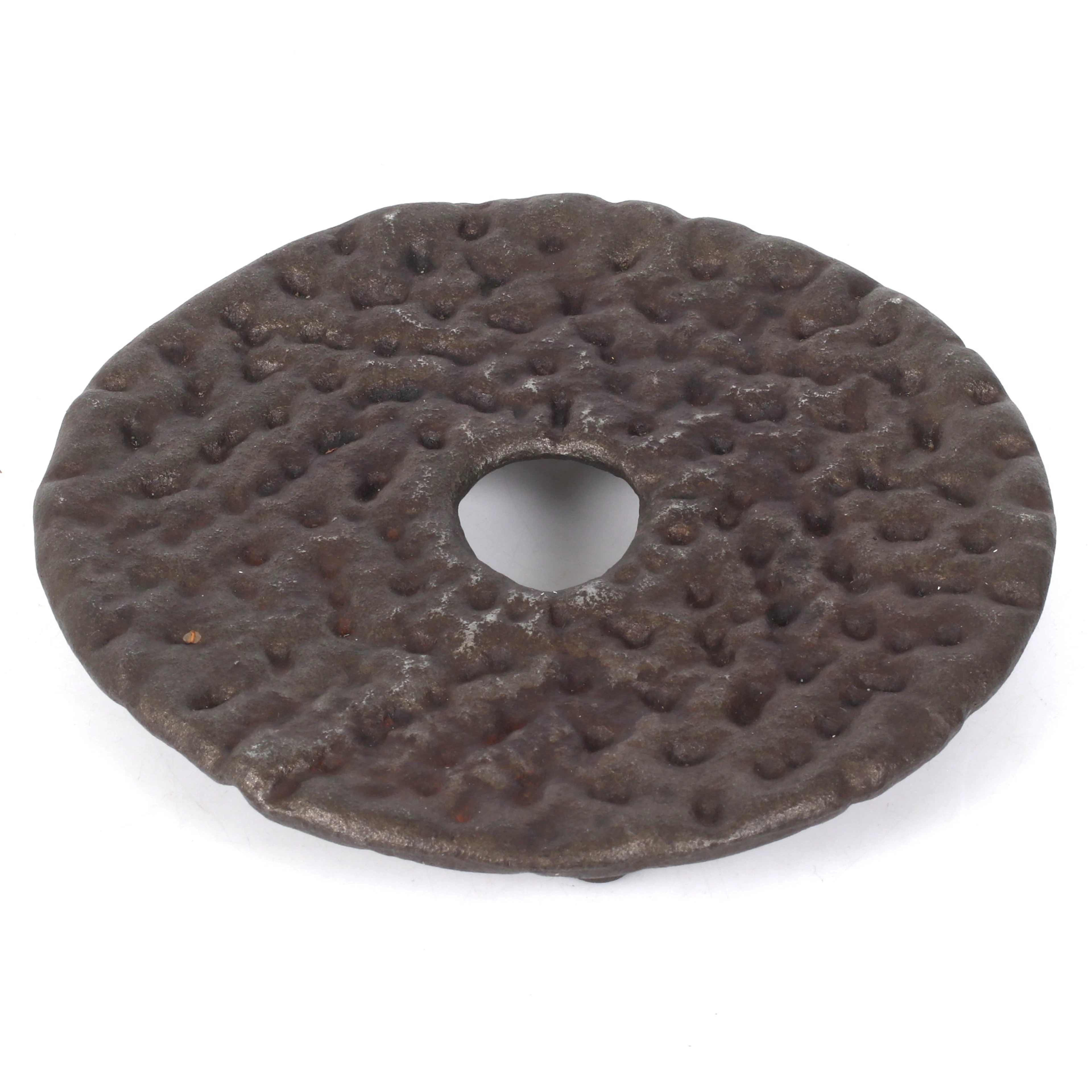 GRYTUNDERLÄGG, i form av knäckebröd, gjutjärn, 19/2000-tal.