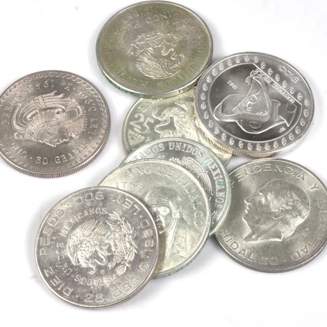 SILVERMYNT. 8 st. bl.a. 5 Pesos, Mexico. 1900-tal.