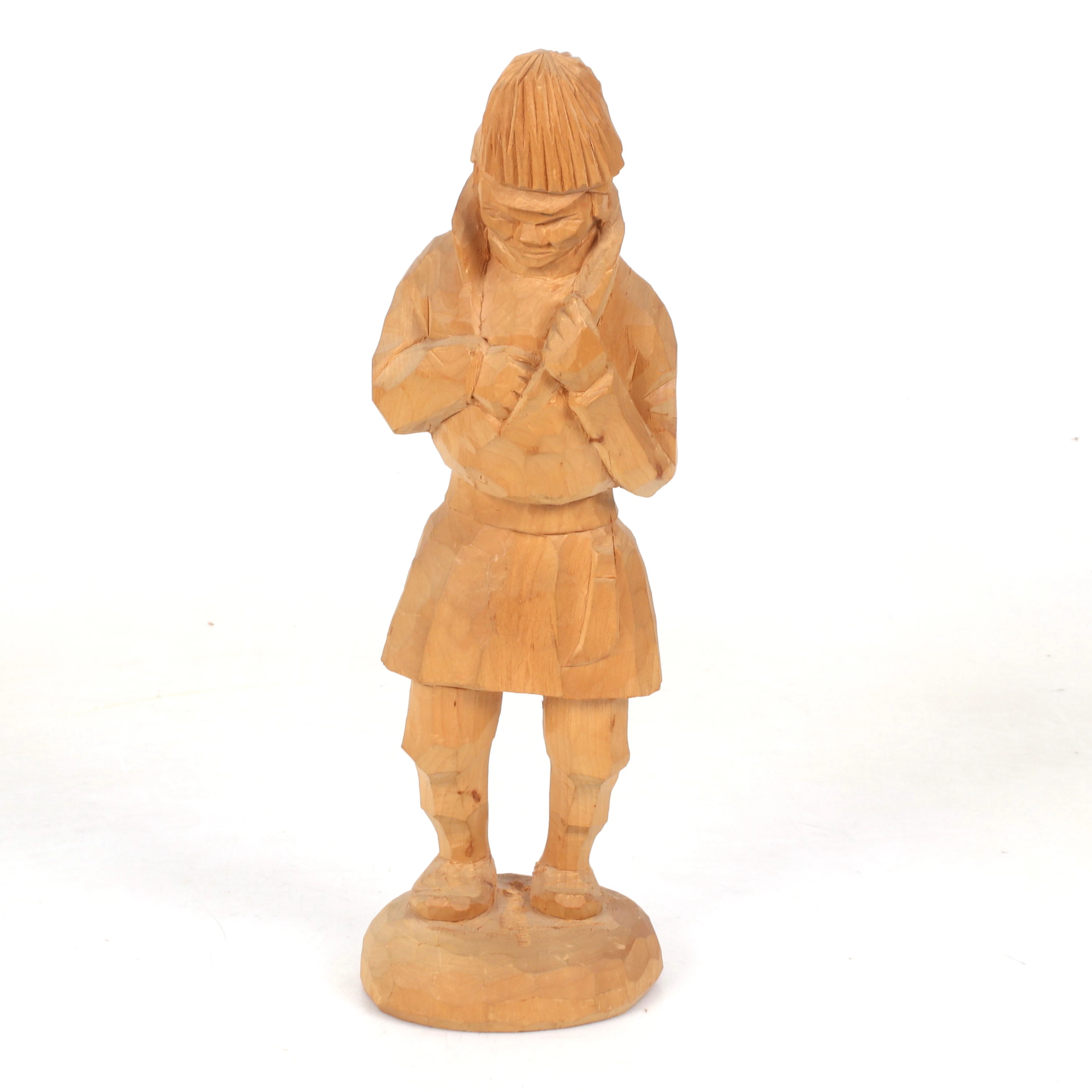 GEORG JONSSON. Skulptur, Same, skuret trä, monogramsignerad.