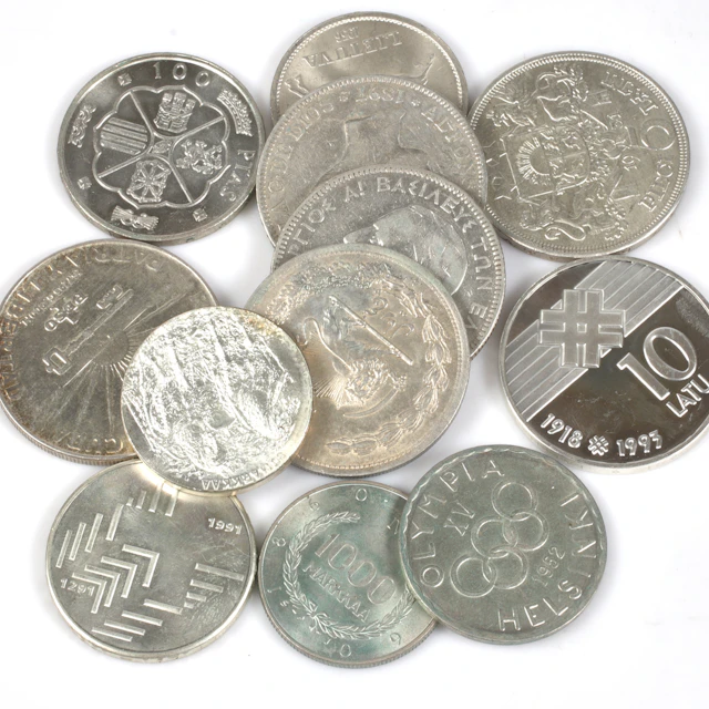 SILVERMYNT. 12 st. bl.a. 1 Peso, Cuba. 1900-tal.