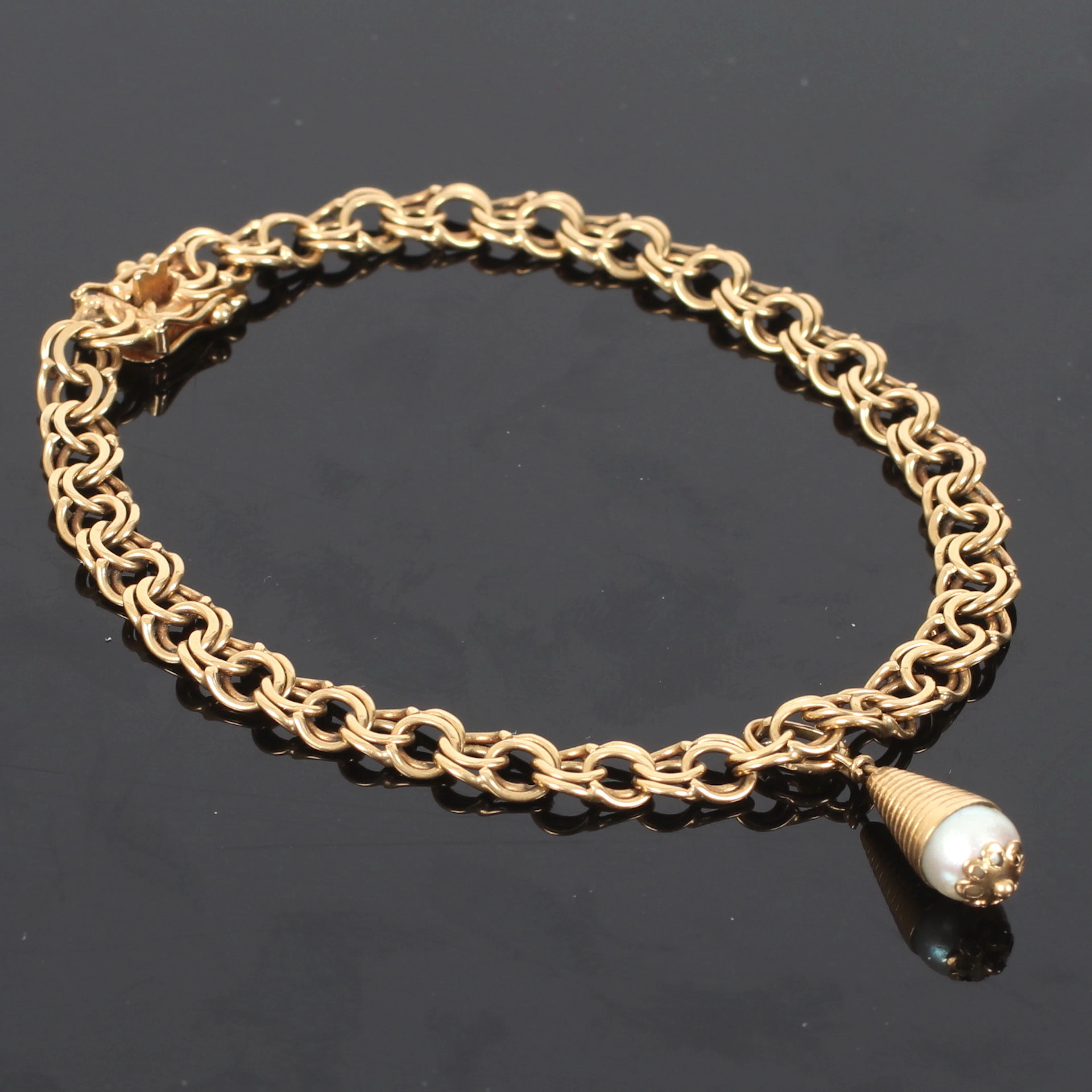 ARMBAND, 18k guld, med berlock.