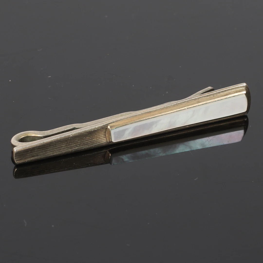 (2610-208) SLIPSHÅLLARE, silver, 1900-tal.