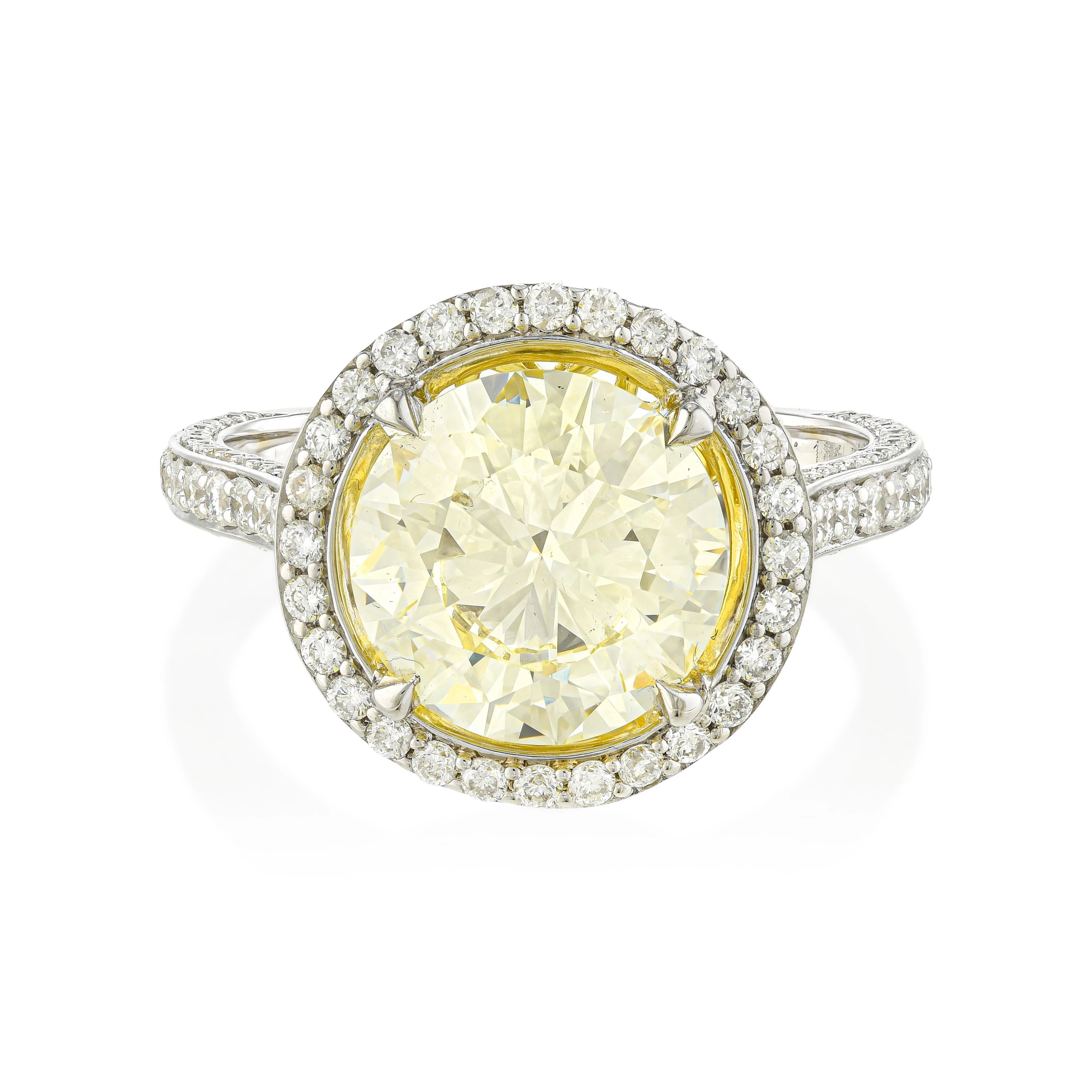 Fancy Light Yellow Diamond Halo Ring