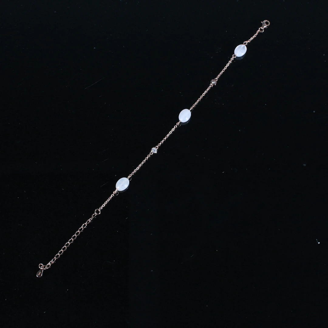 MERALIN JEWELRY. Armband besetzt mit Zirkonia und Rosaquarz, 925er