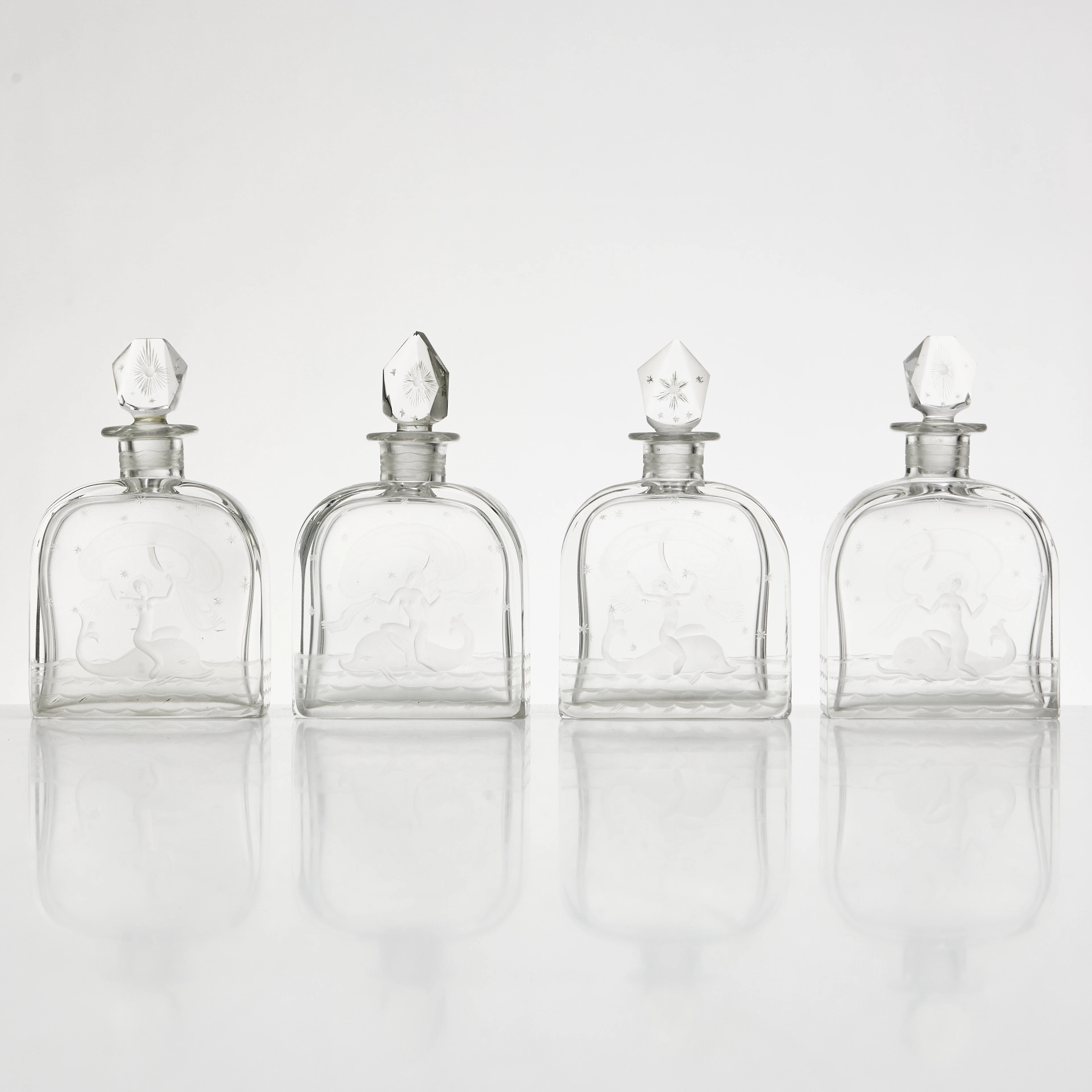EDWARD HALD. Flakonger, 4 st., etsad glas, nymf på delfin, Orrefors, signerade.