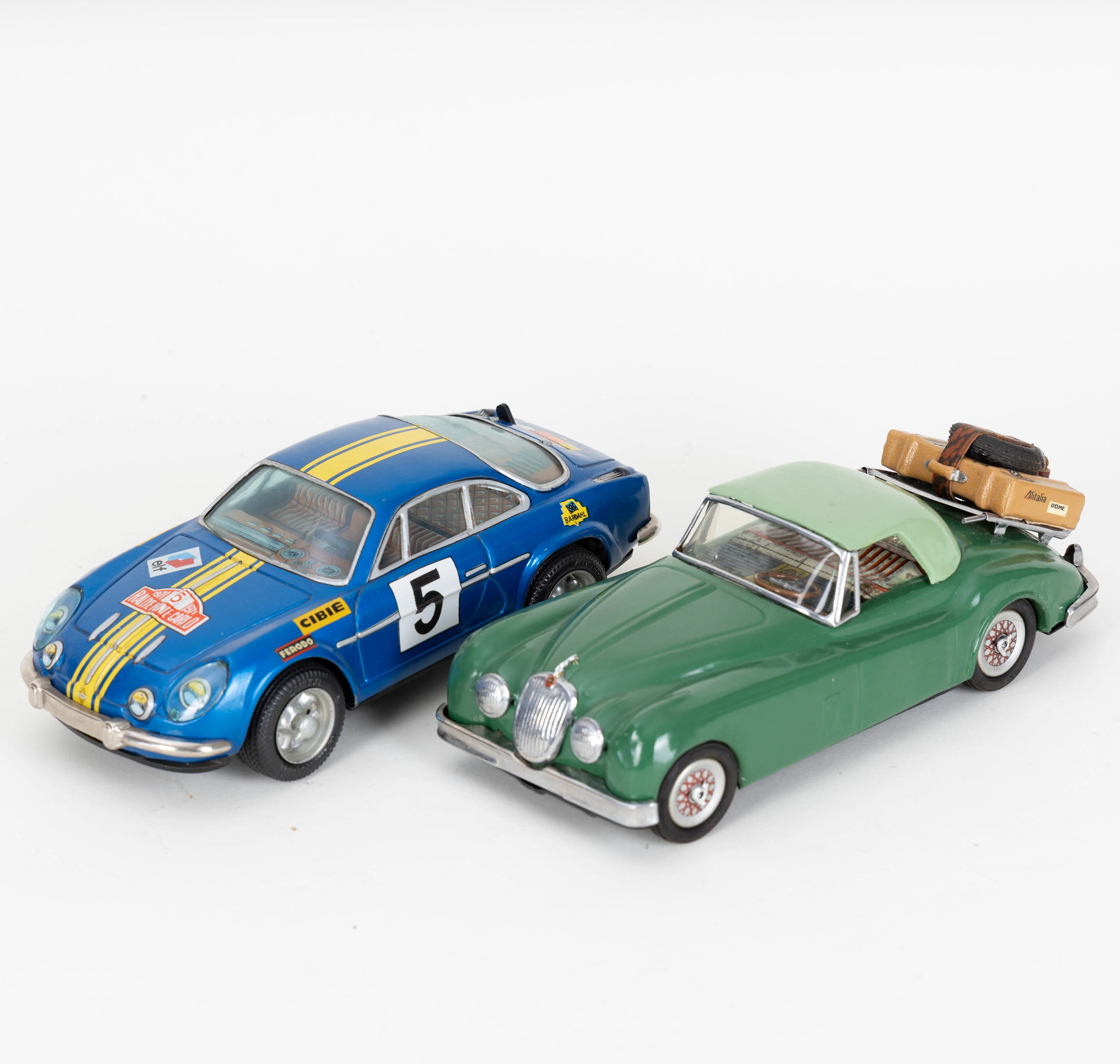 Zwei Blechautos: Daiya Japan, Alpine Renault und ein Jaguar, 1950er-1970er