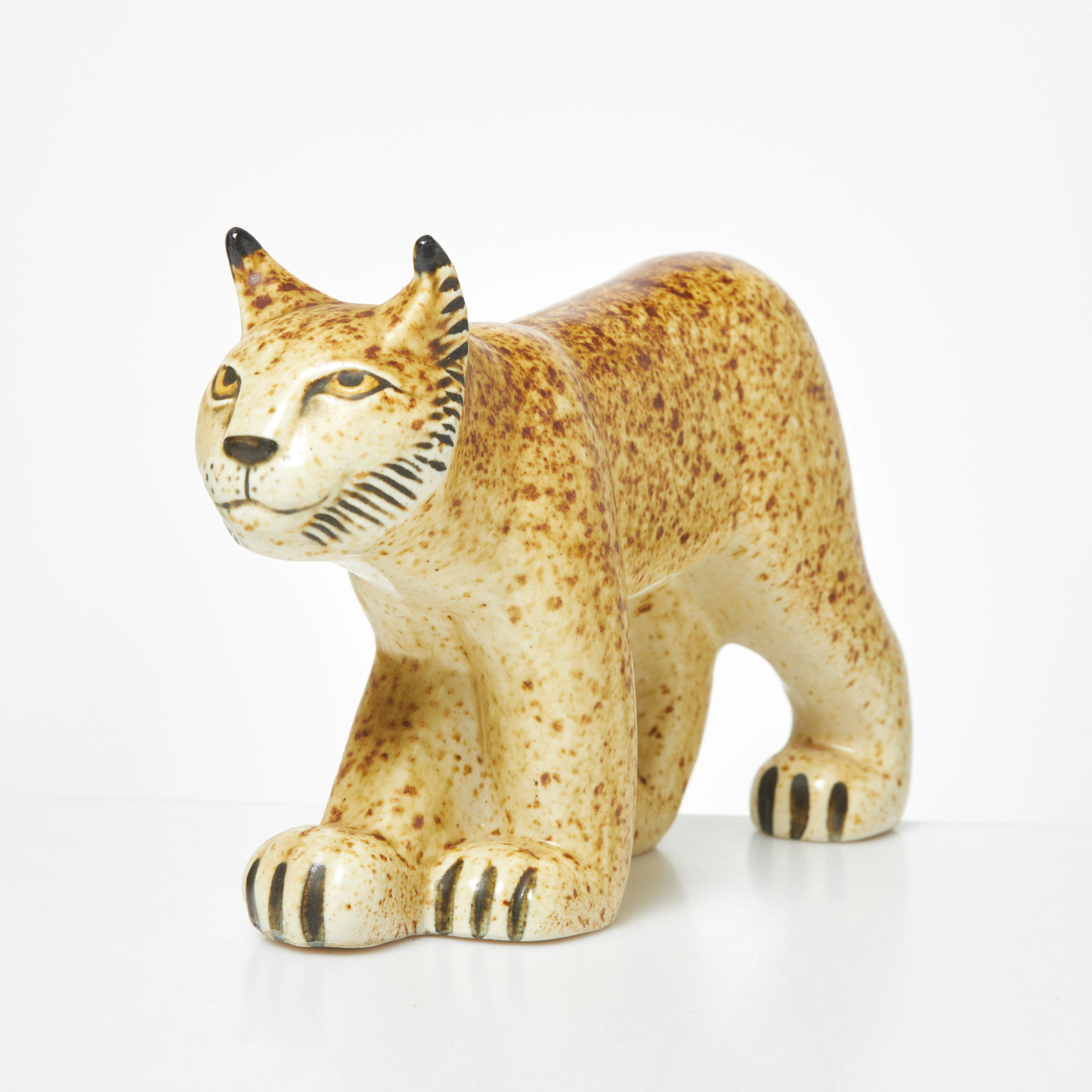 LISA LARSON. Figurin, stengods, "Lokatt", ur serien "Utrotningshotade