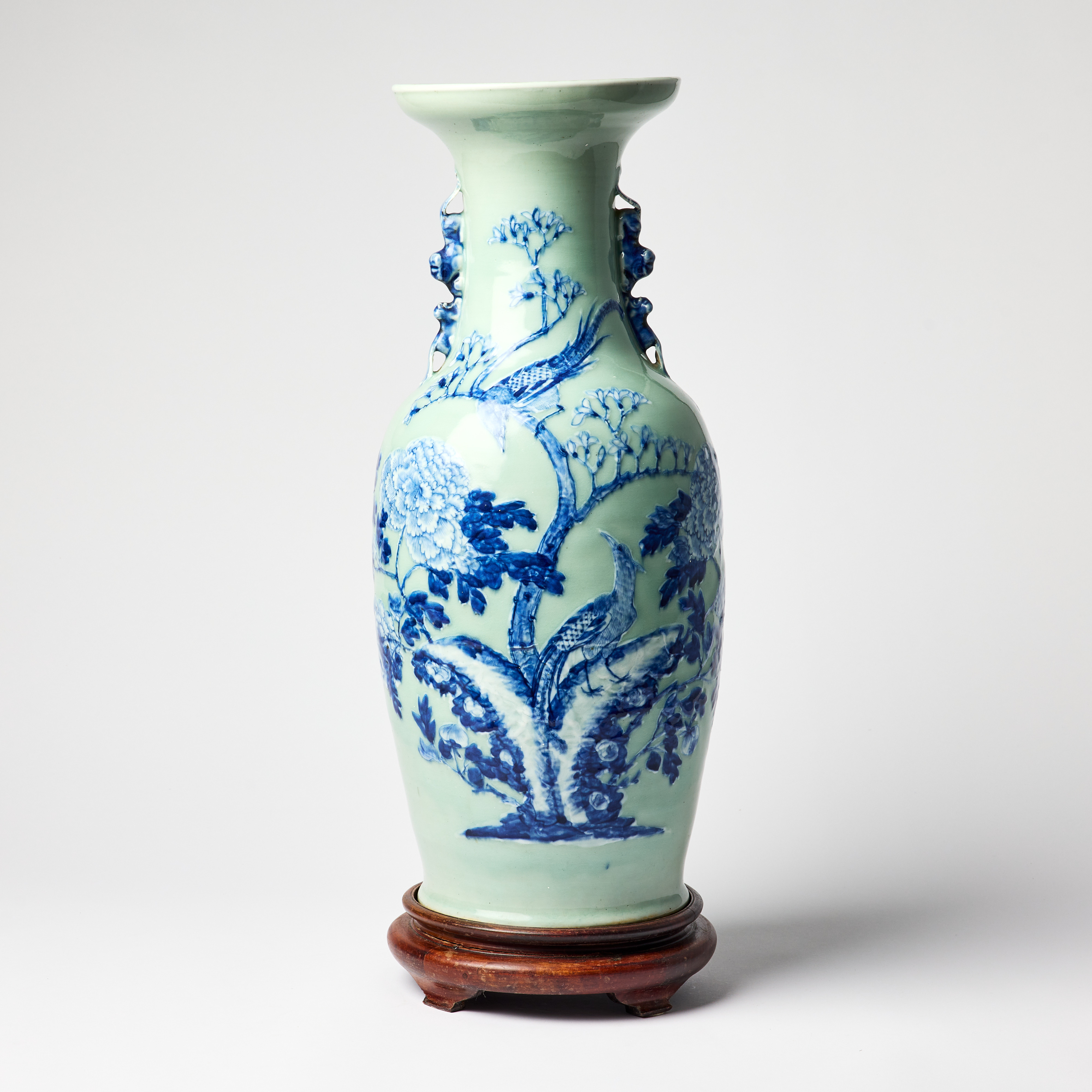 A Chinese Moulded Blue and White Celadon-Ground Vase.