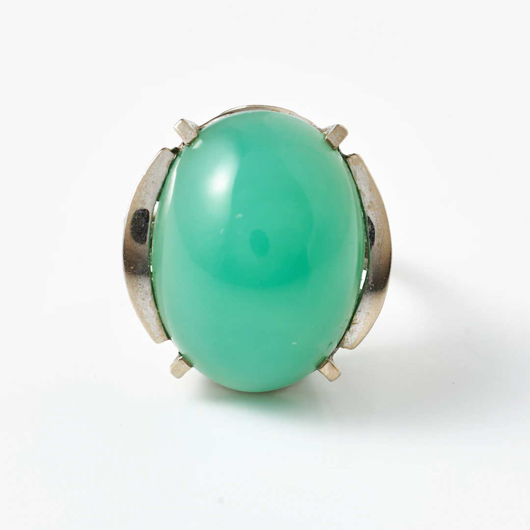 RING, 14 k rodierat vitguld, cabochochonslipad krysopras.