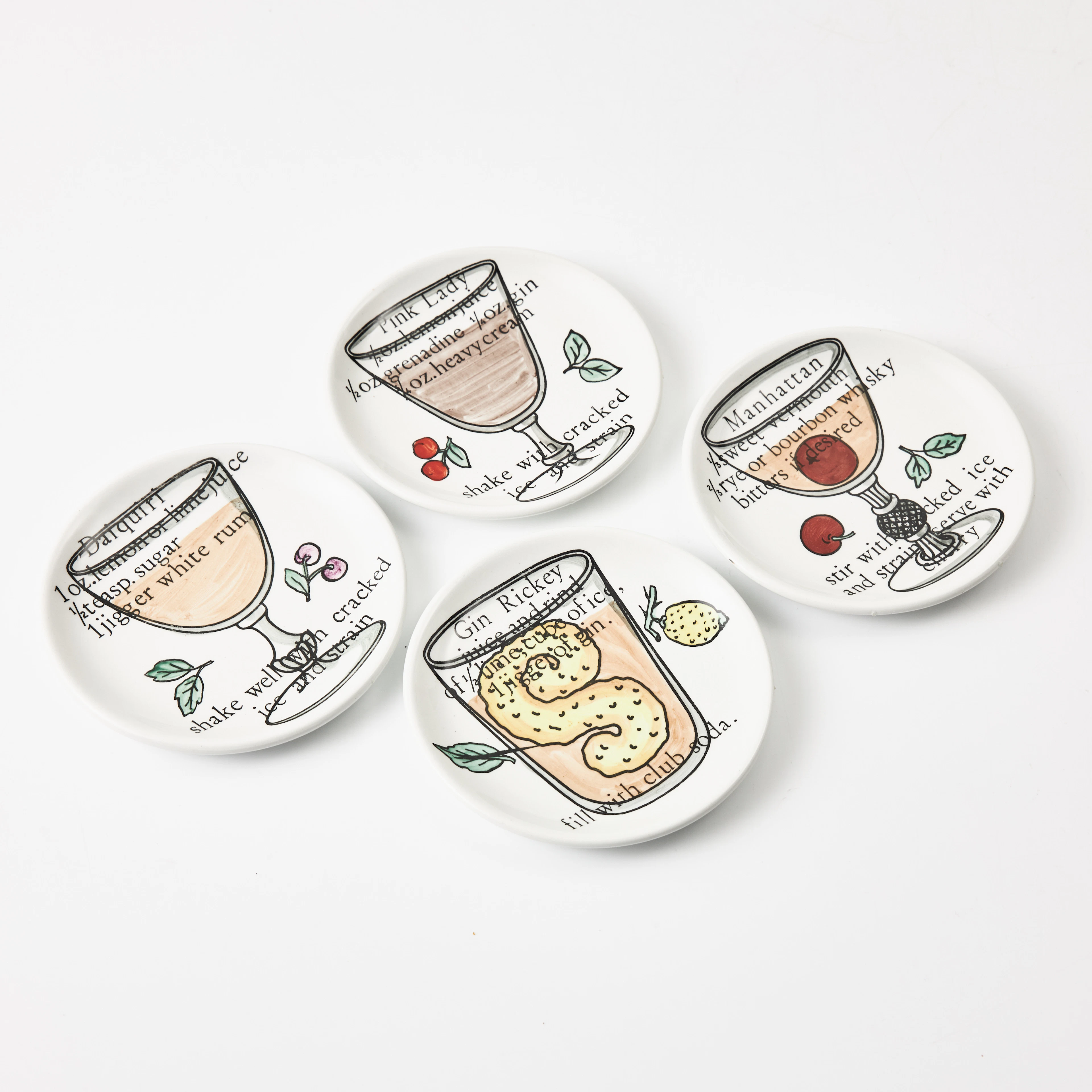 PIERO FORNASETTI. "Cocktail", coasters, 8 st, Italien, 1900-talets mitt.