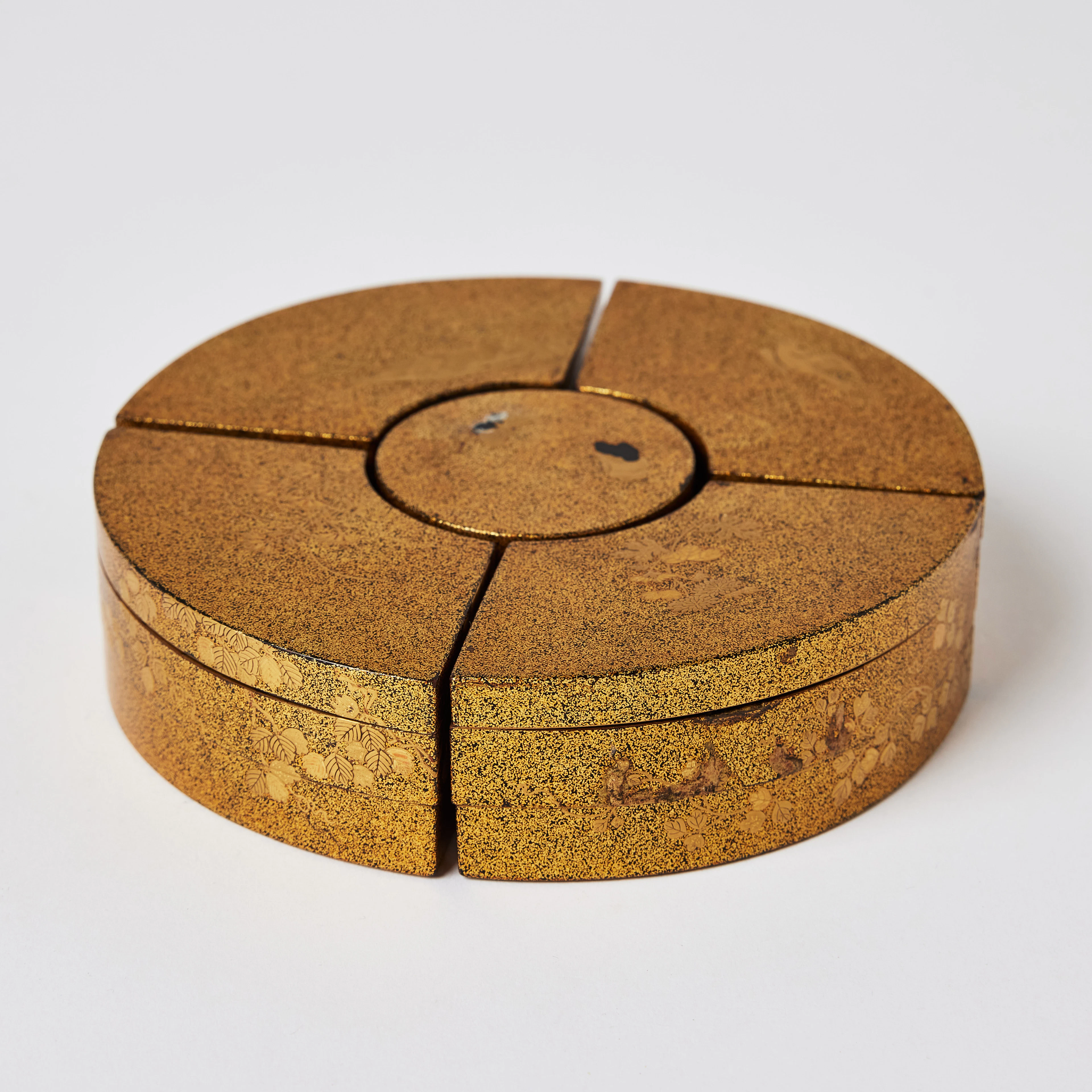 A Set of Five Japanese Circular Two-Tier Lacquer Boxes.