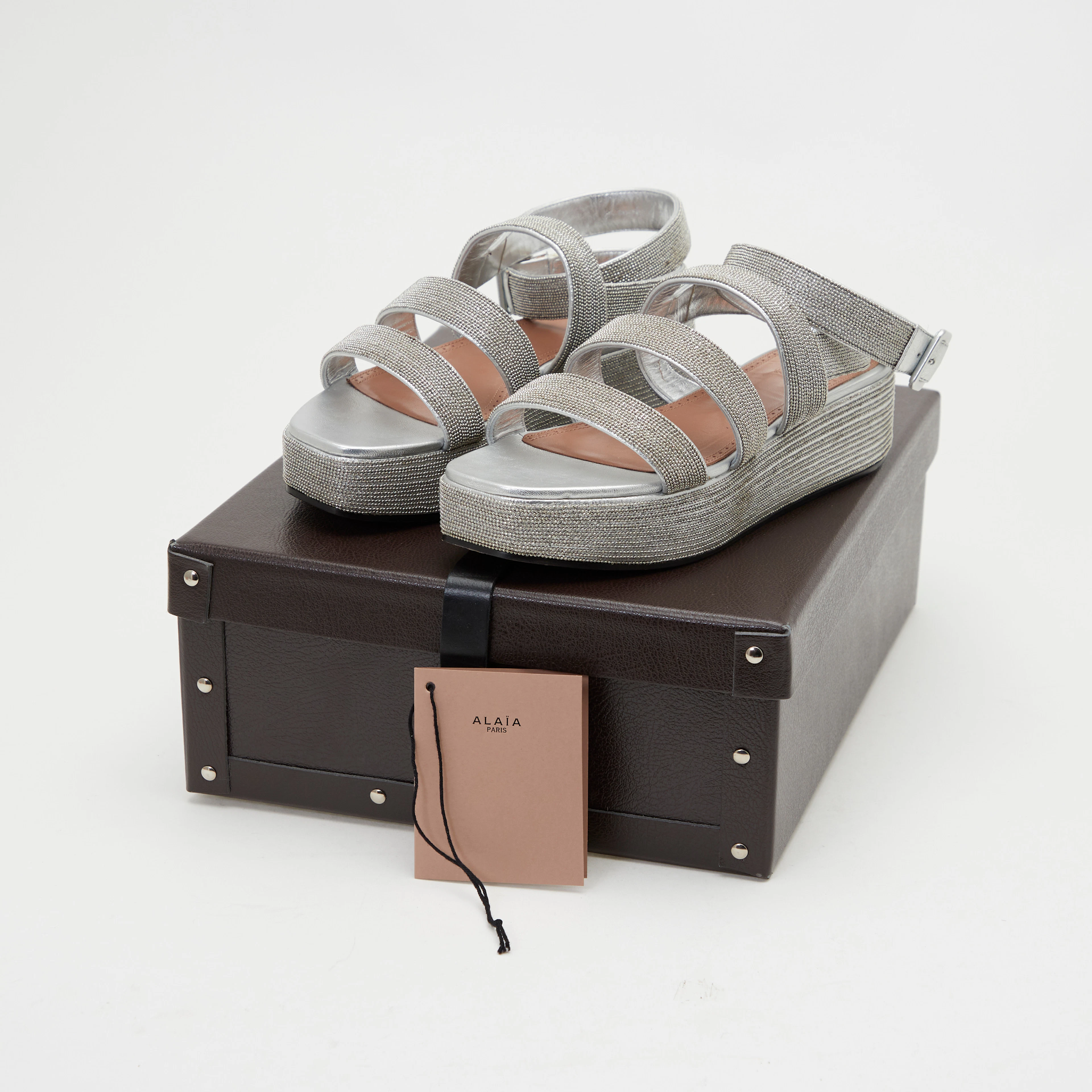 ALAÏA. Sandalen mit Originalkarton, Modell 'Peau Lame Rocaille', Leder