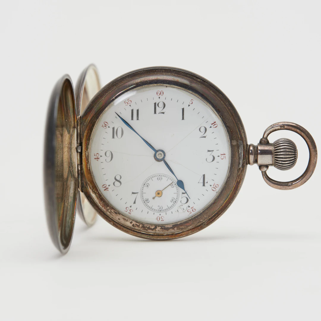 THE CONSORT / DENNISON. Savonnette-Taschenuhr, Handaufzug, 925er Silber