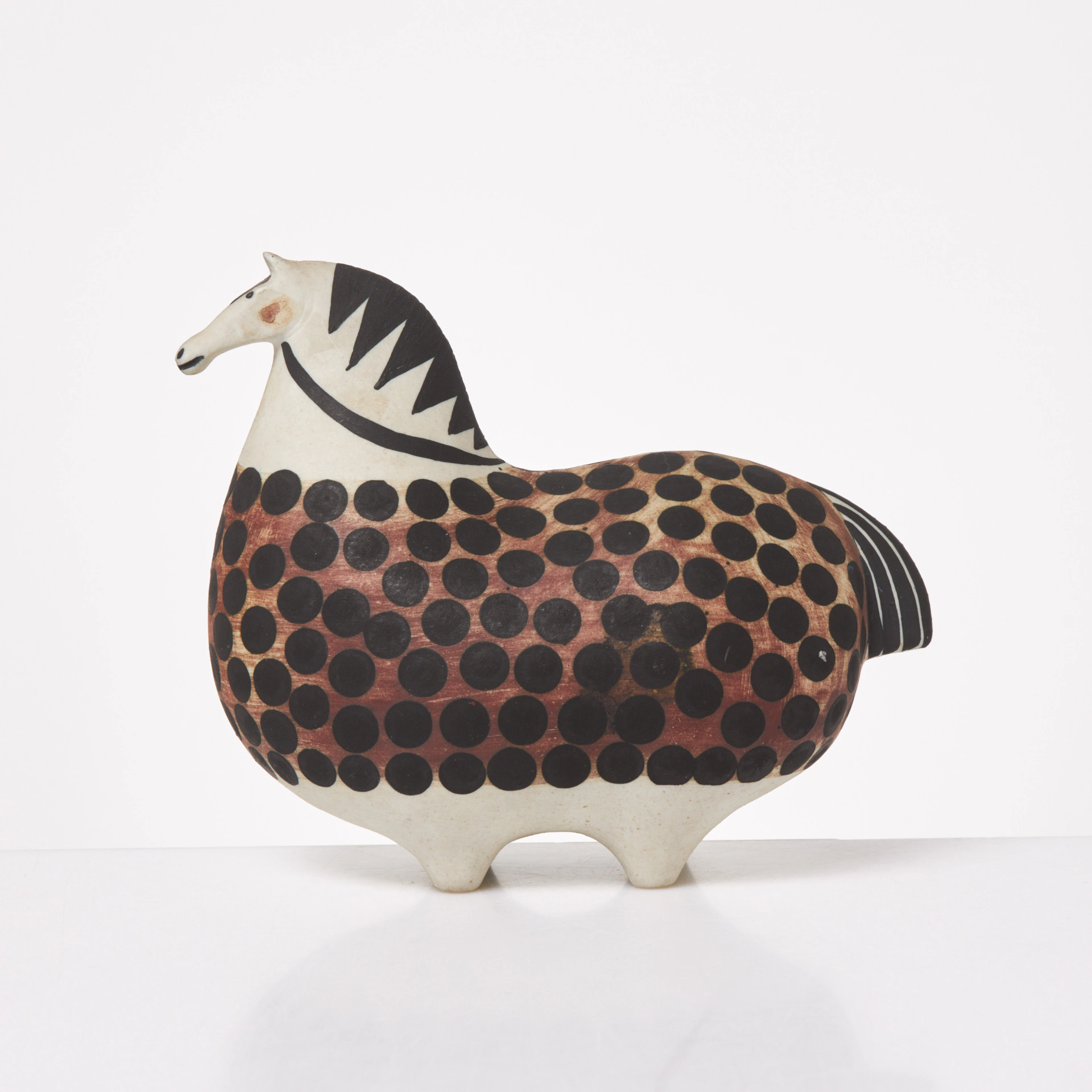 STIG LINDBERG. Figurin, "Springare", stengods, signerad Stig L. studiohanden