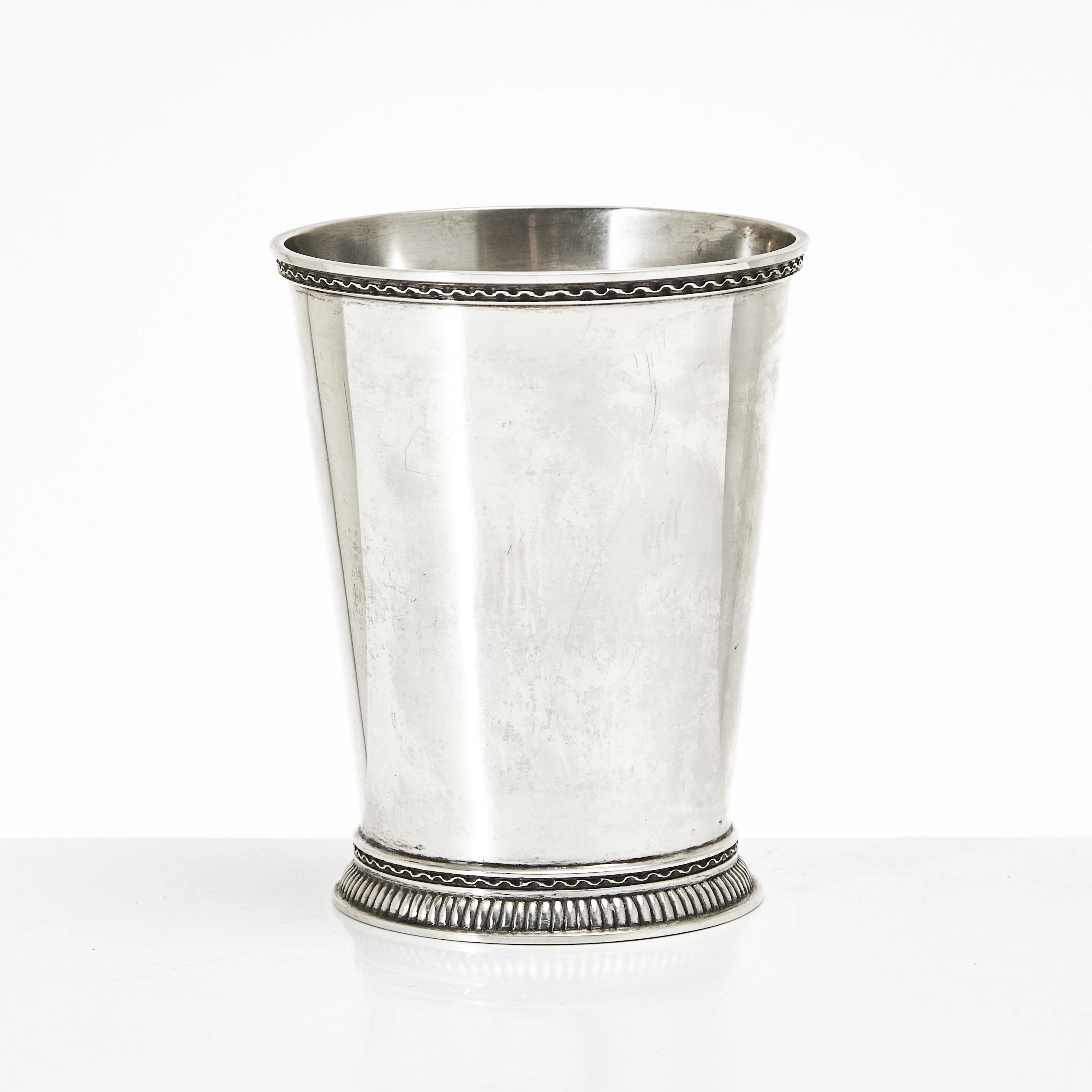 ERIC RÅSTRÖM. Bägare, silver, lätt konisk form, godronnerad fot, dubbla