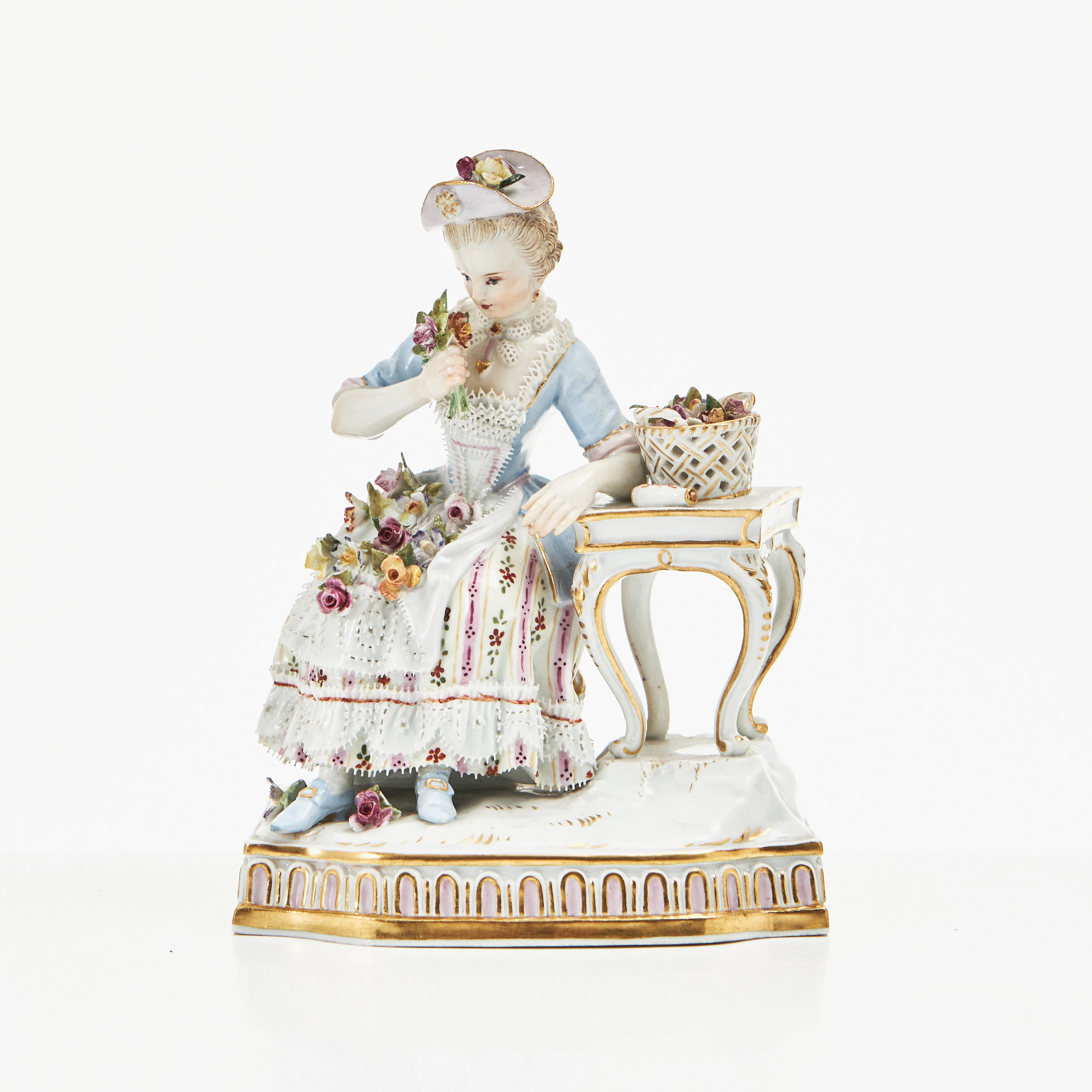 MEISSEN, figurin, 18/1900-tal, kvinna vid bord.