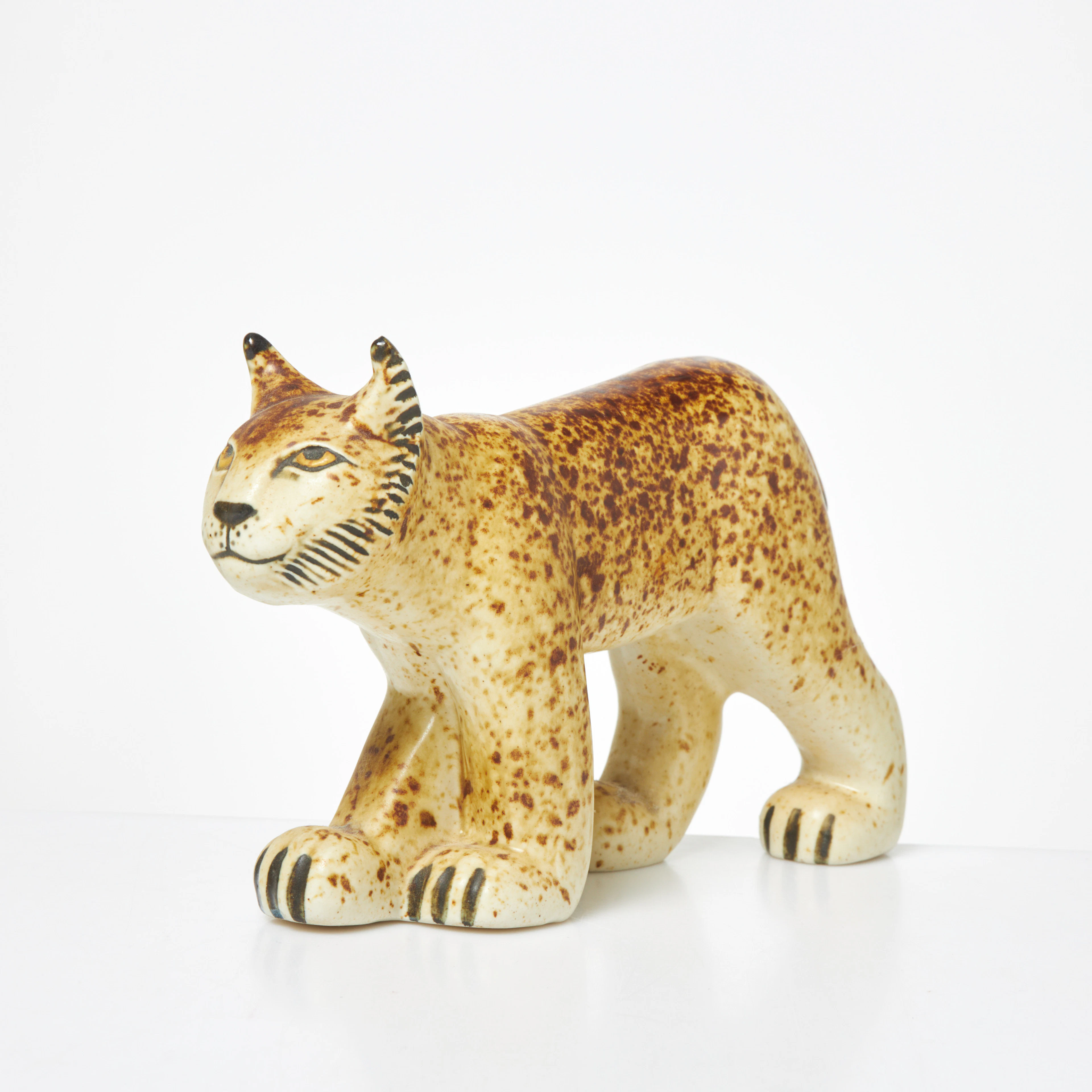 LISA LARSON. Figurin, stengods, "Lokatt", märkt World Wildlife Fund WWF, NK.
