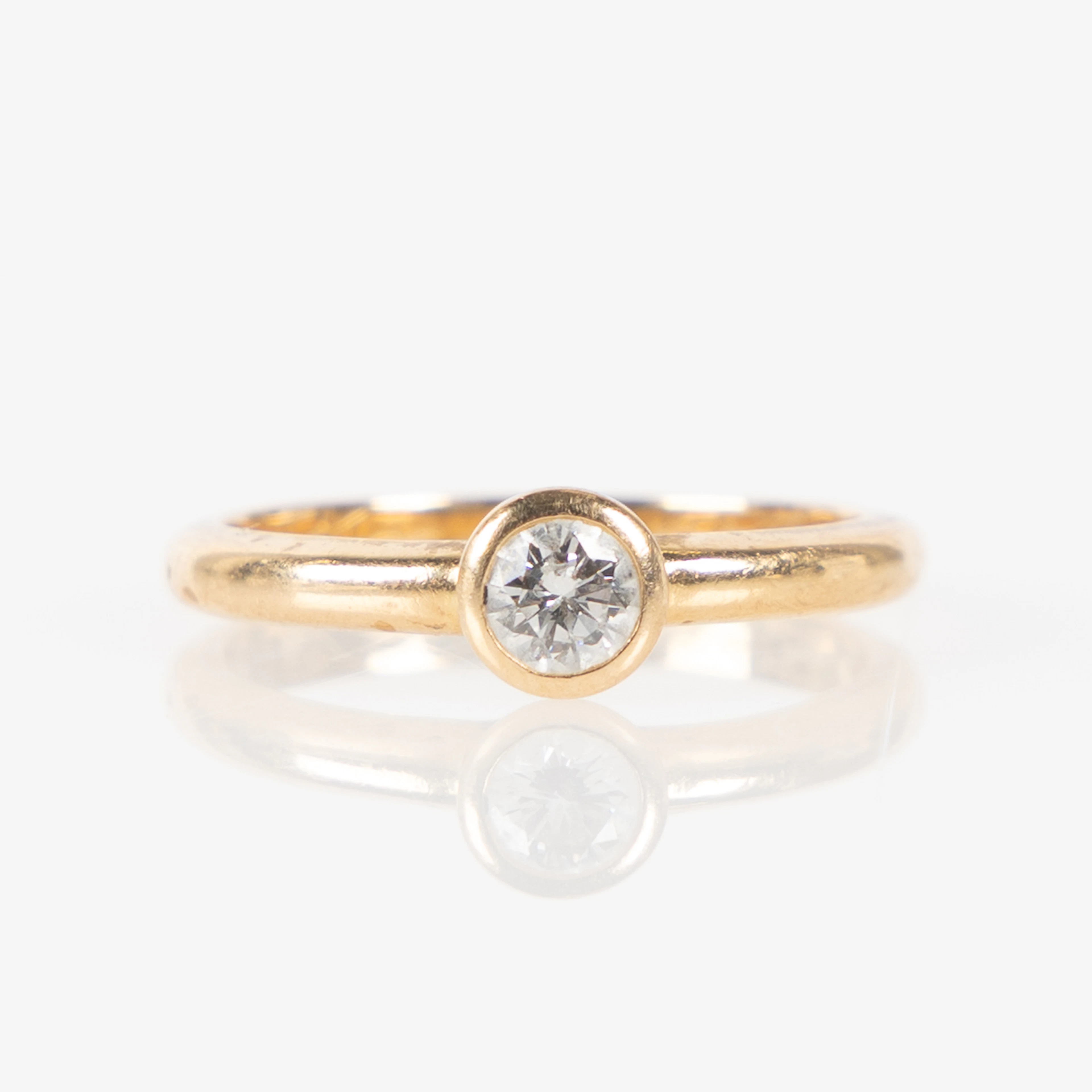 RING, 18K guld med briljantslipad diamant 0.25 ct.