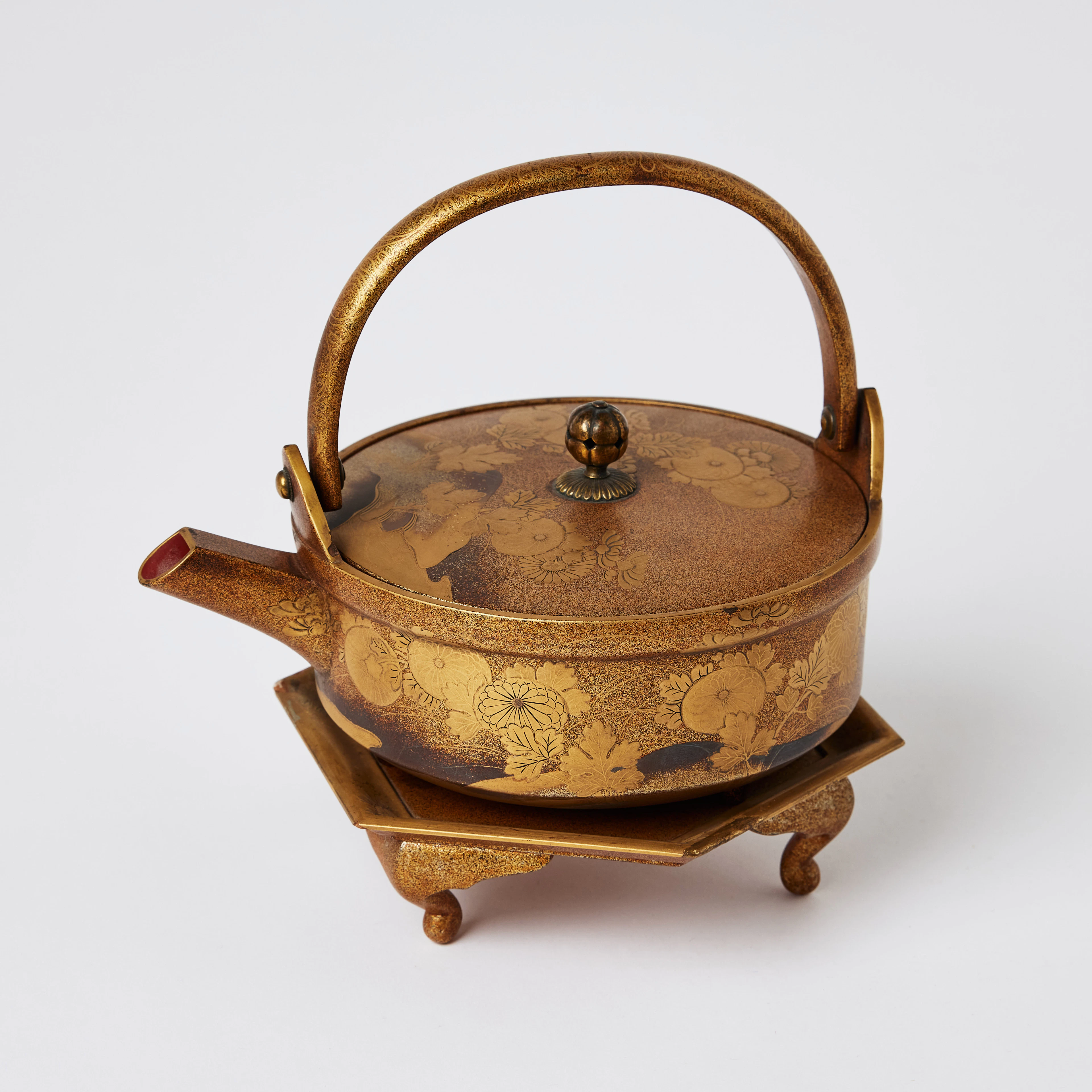 A Japanese Sake Ewer 'Choshi' and Hexagonal Stand.