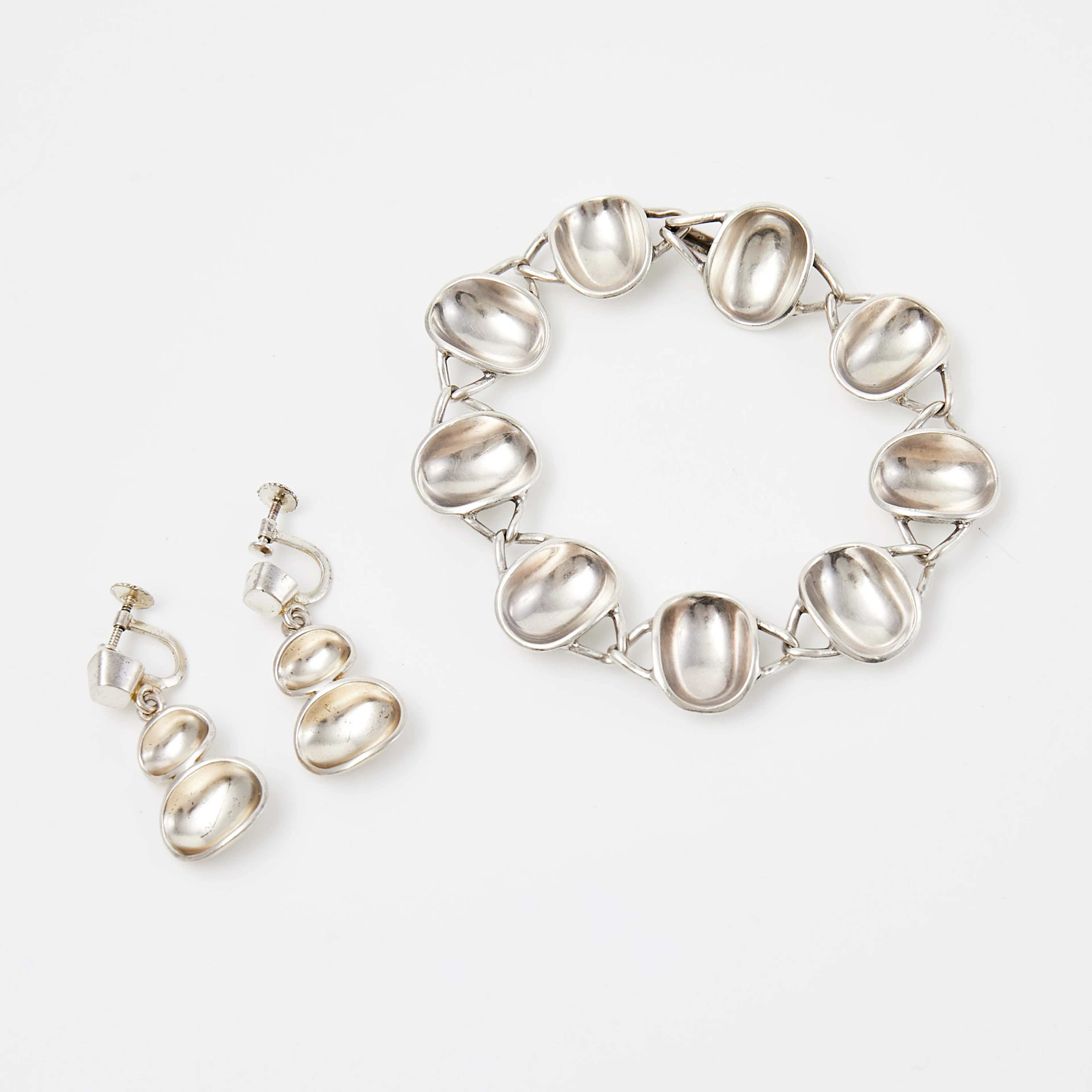SIGURD PERSSON. ARMBAND samt ÖRHÄNGEN, 1 par, sterling silver, för