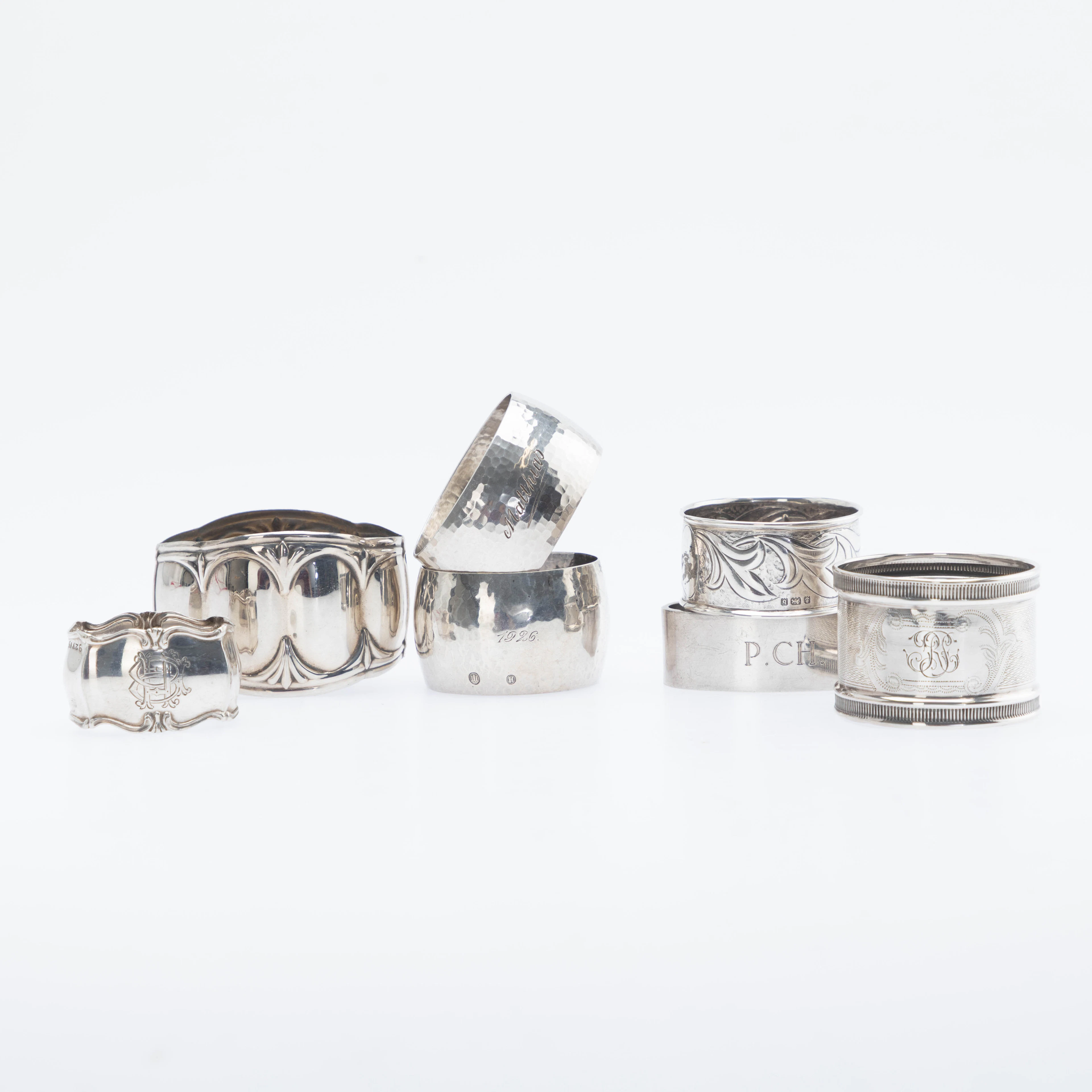 Sammlung von sieben verschiedenen Serviettenringen, Silber, Deutschland