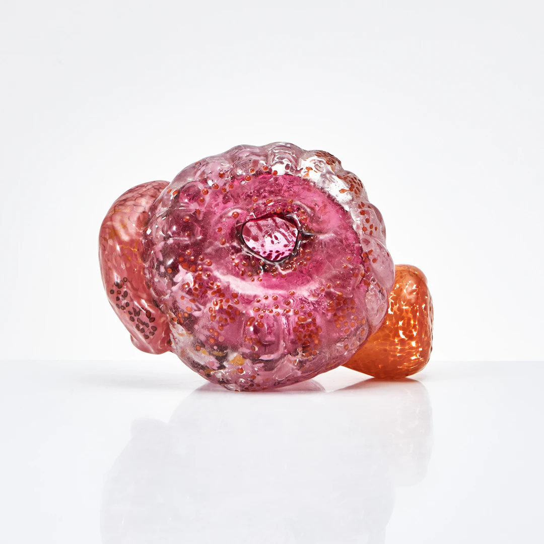 SKULPTUR, 1900-talets slut, underfång i rosa och orange.