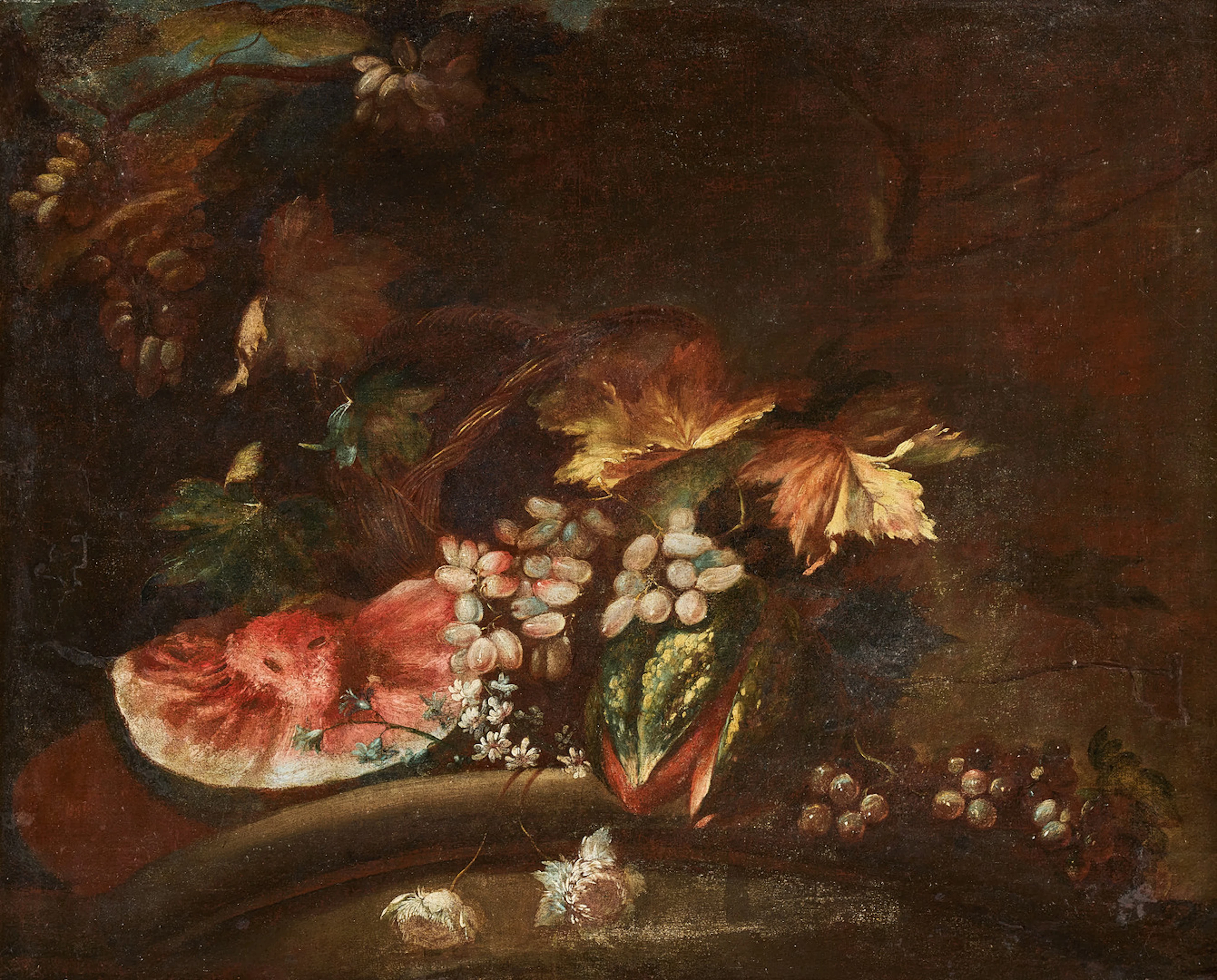 VENETIAN SCHOOL, CA. 1720. Still life with a watermelon and grapevines