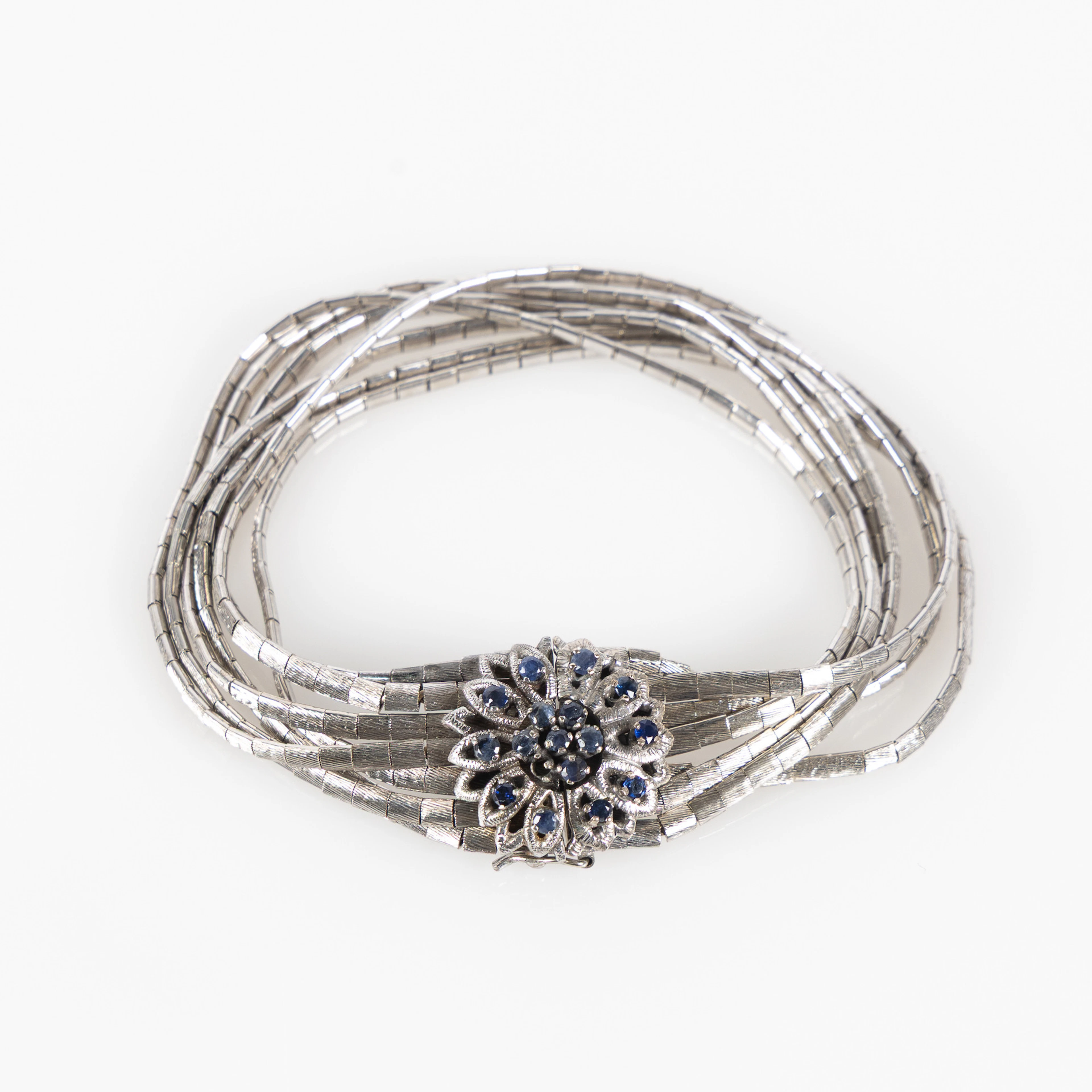 ARMBAND, 18K vitguld och fasettslipade safirer, Vicenza, Italien.