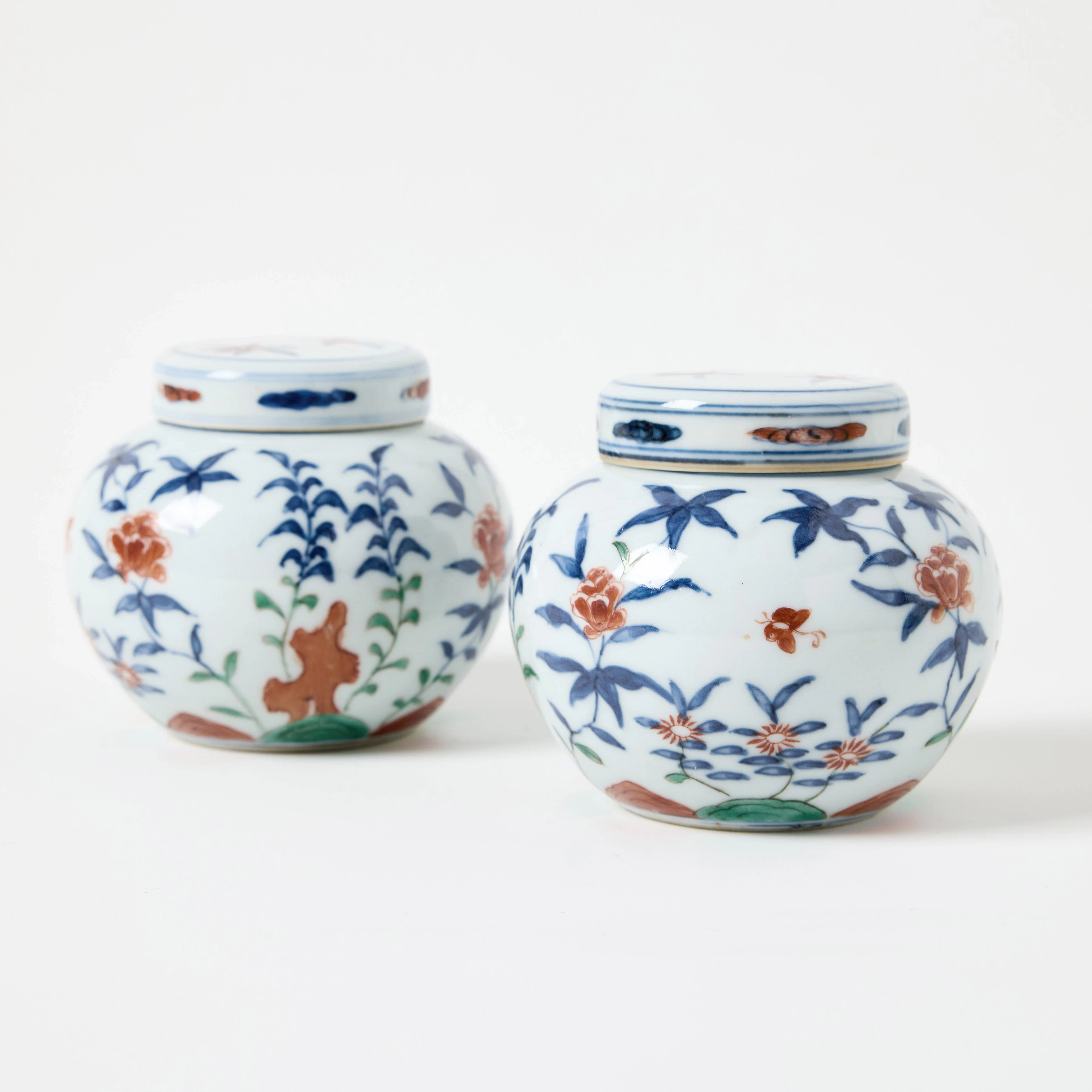 A Pair of Small Chinese Ming-Style Doucai Jars and Covers.