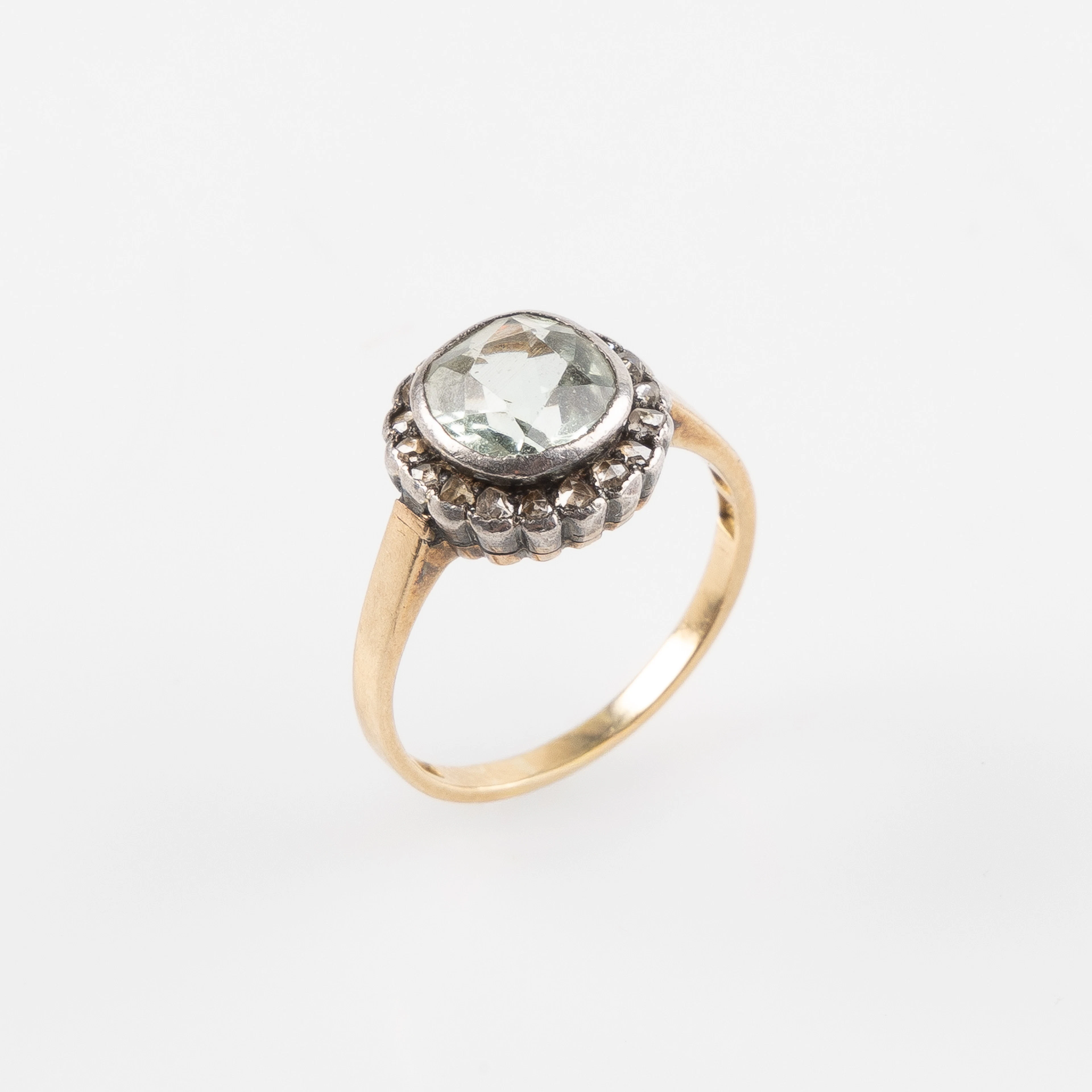 RING, 18K guld och silver med fasettslipad akvamarin och rosenslipade