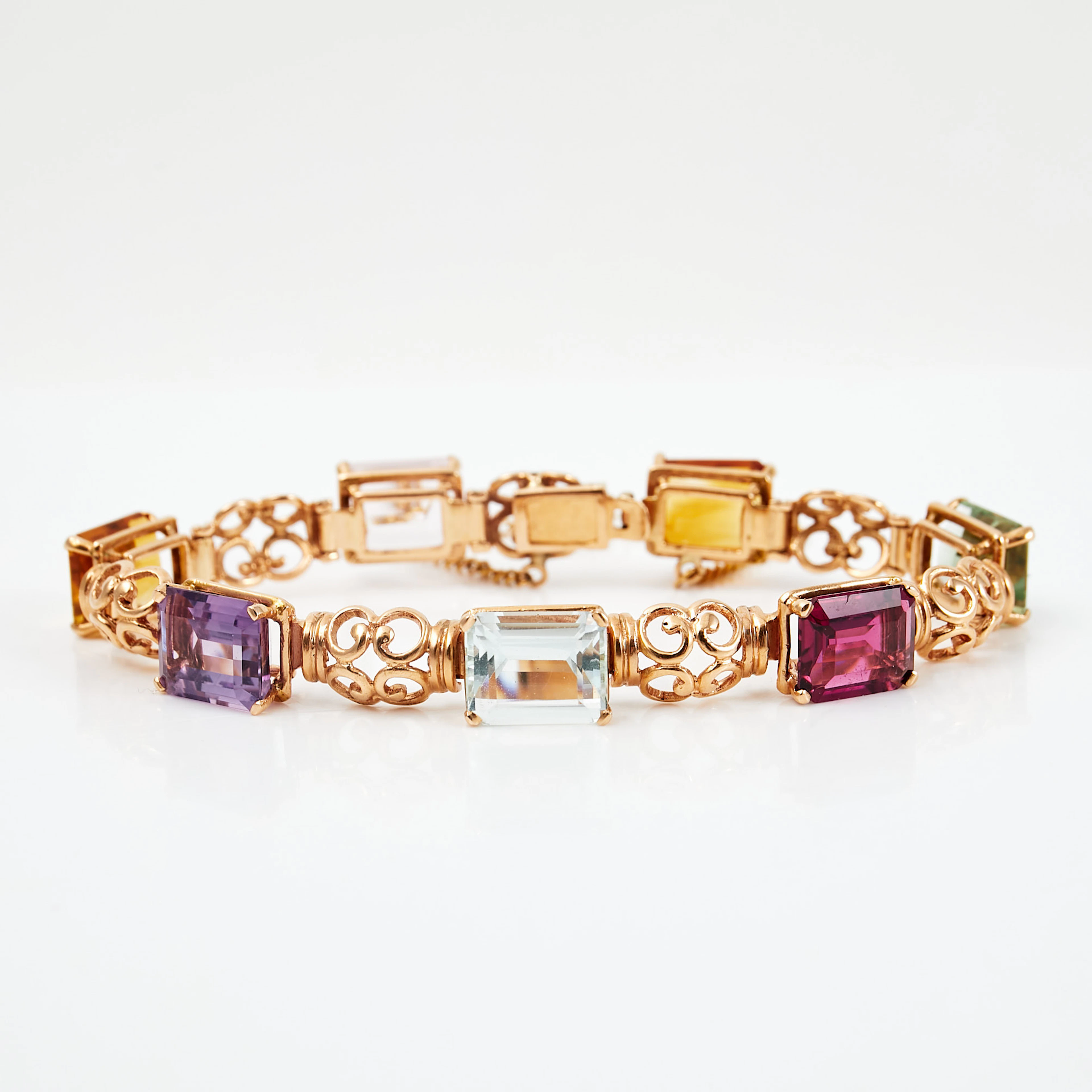 ARMBAND, 18 k guld, dekor av smaragdslipad goshenit, citrin, ametist