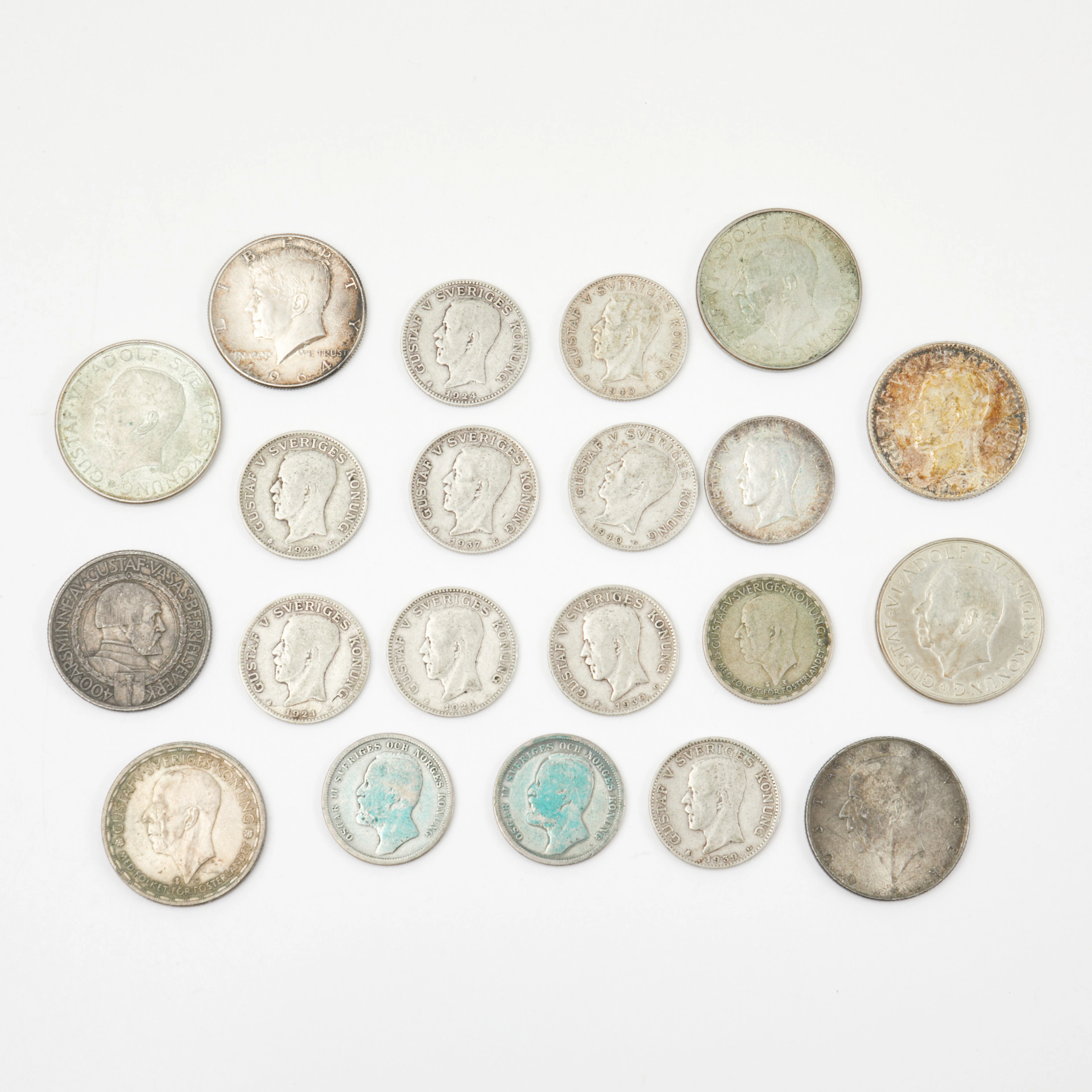 MYNT. 21 st, silver, Svenska samt USA.