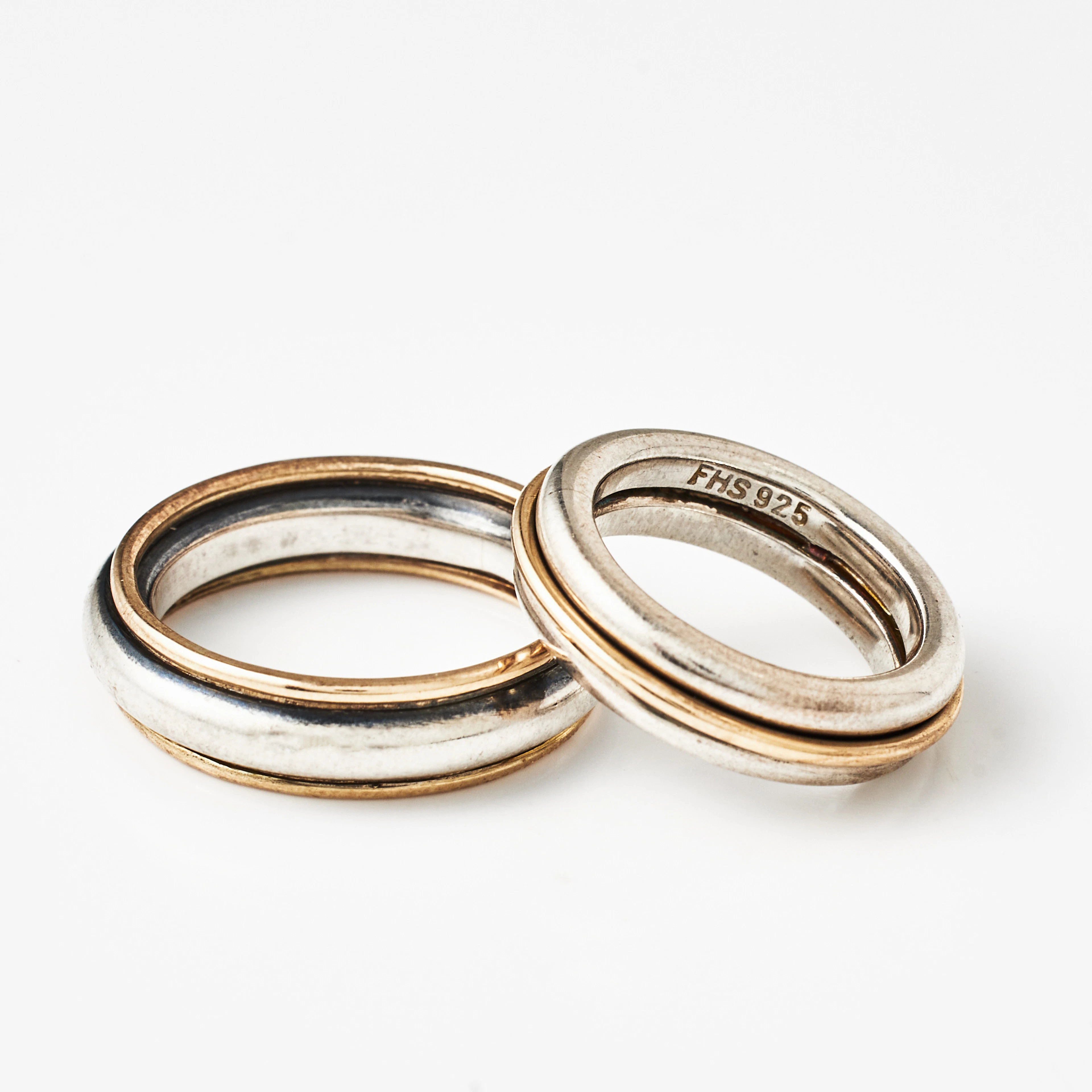HEIRING JEWELLERY, ringar, 2 st., sterlingsilver samt delvis förgyllda.