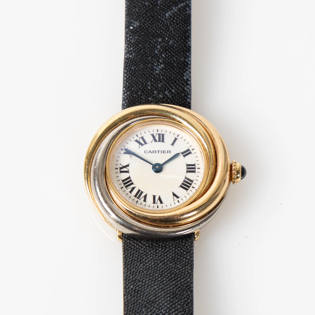 CARTIER, damarmbandsur 'Trinity', 18K guld. Diam 27 mm.