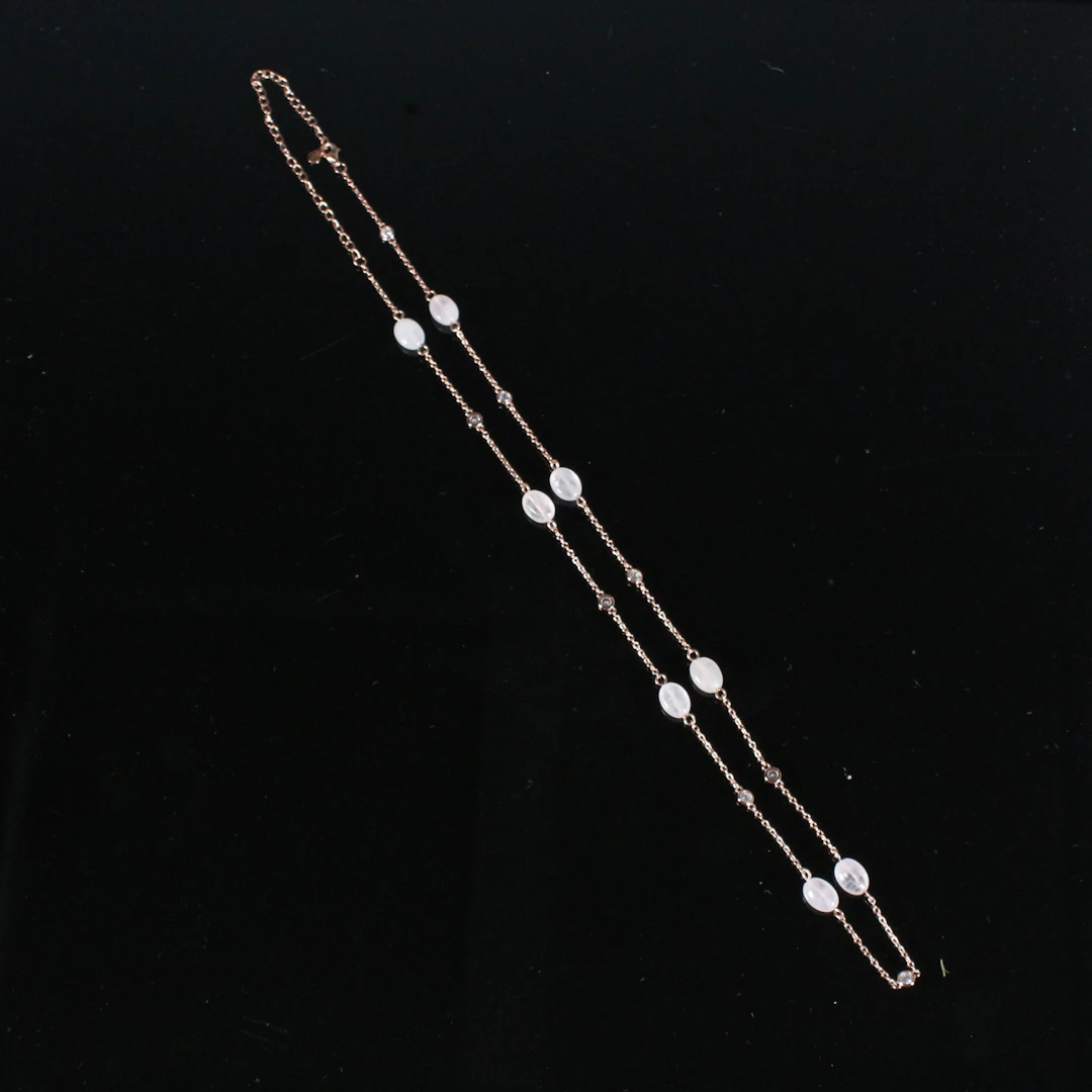MERALIN JEWELRY. Halskette besetzt mit Zirkonia und Rosaquarz, 925er