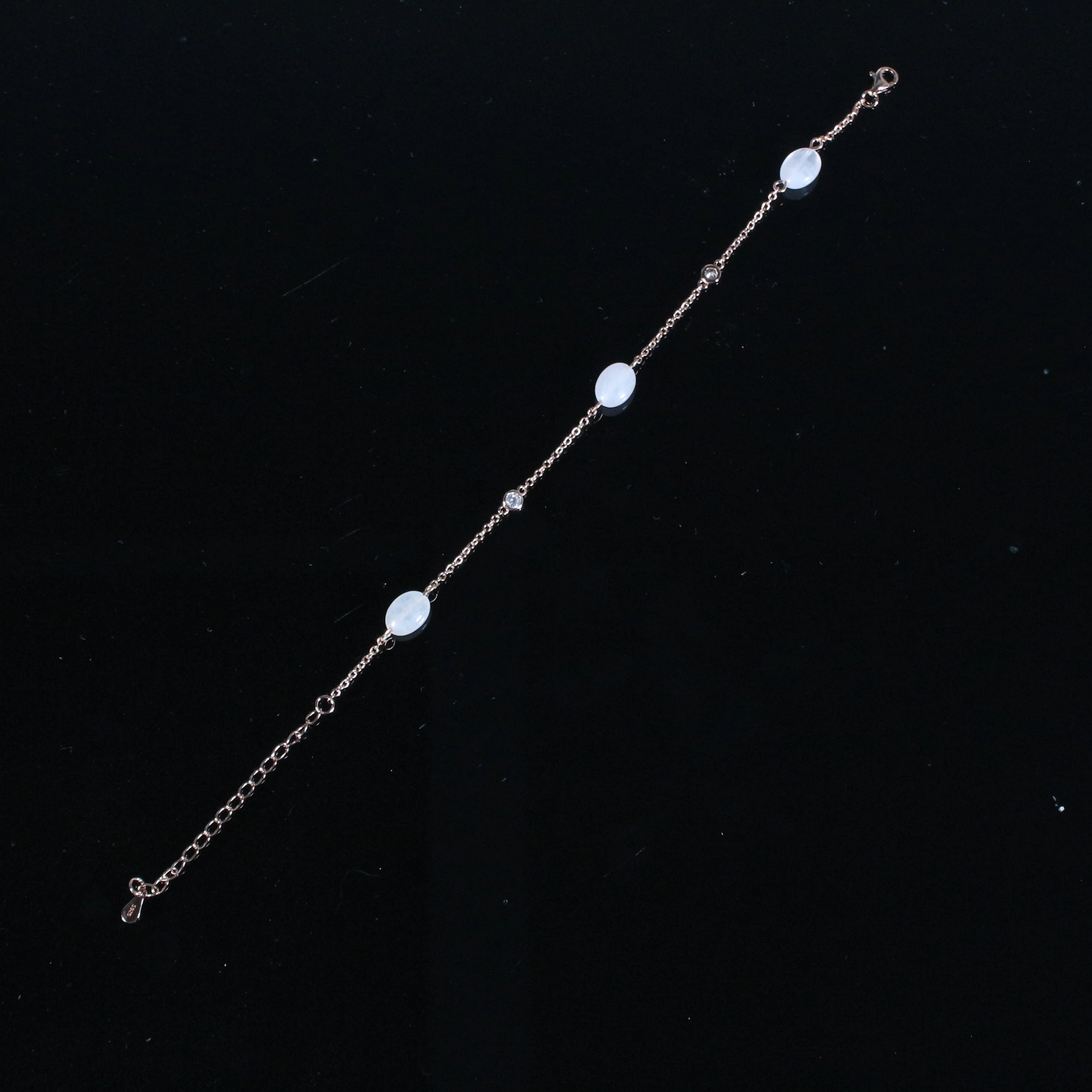 MERALIN JEWELRY. Armband besetzt mit Zirkonia und Rosaquarz, 925er