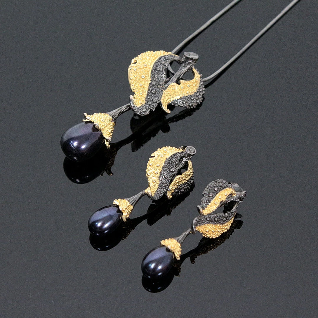 Schmuck-Set - Ohrringe und Anhänger mit Süßwasserzuchtperlen, 925er Silber.