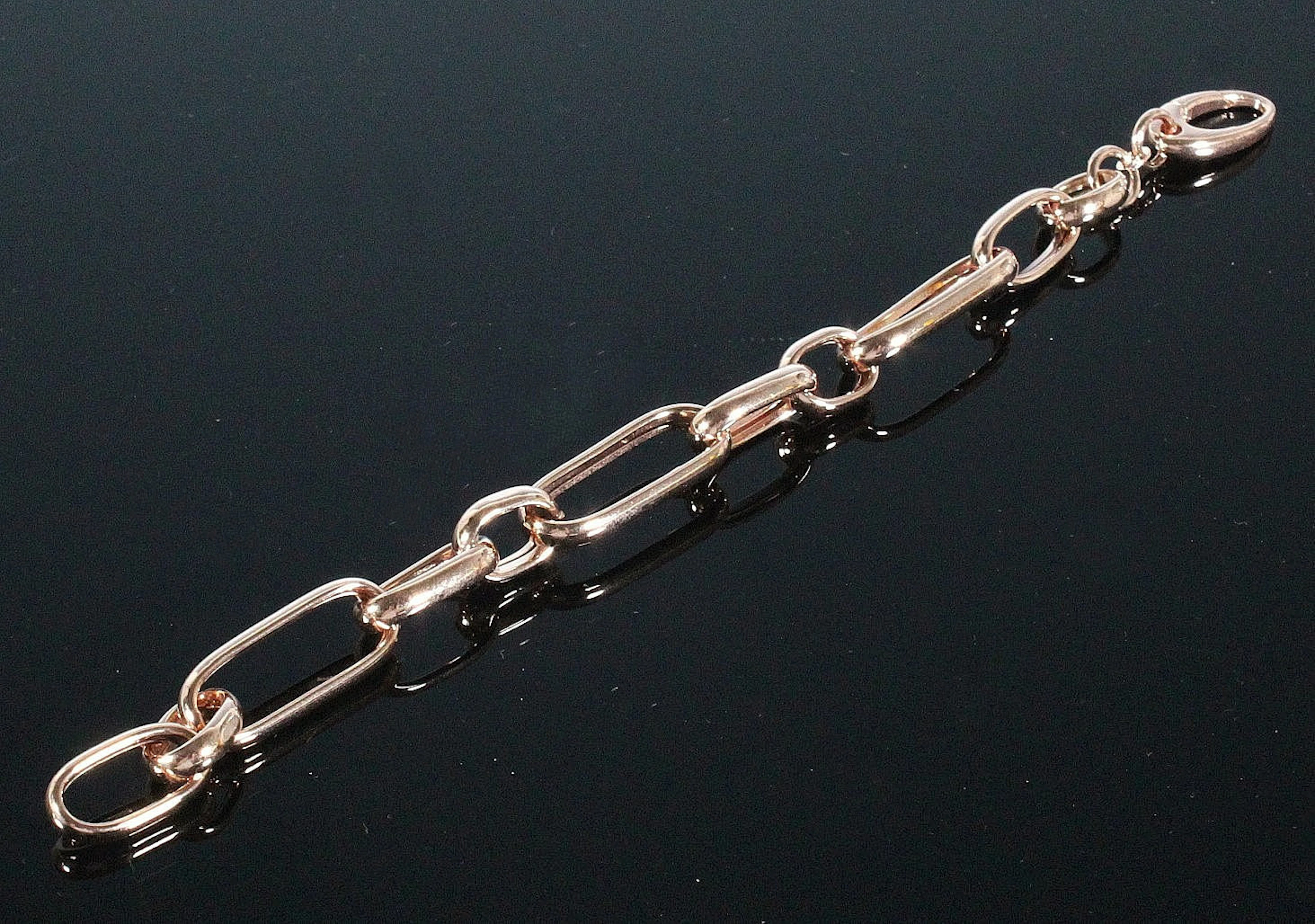 MERALIN JEWELRY. Grobgliedriges Armband aus 925/-Sterlingsilber, rosévergoldet.