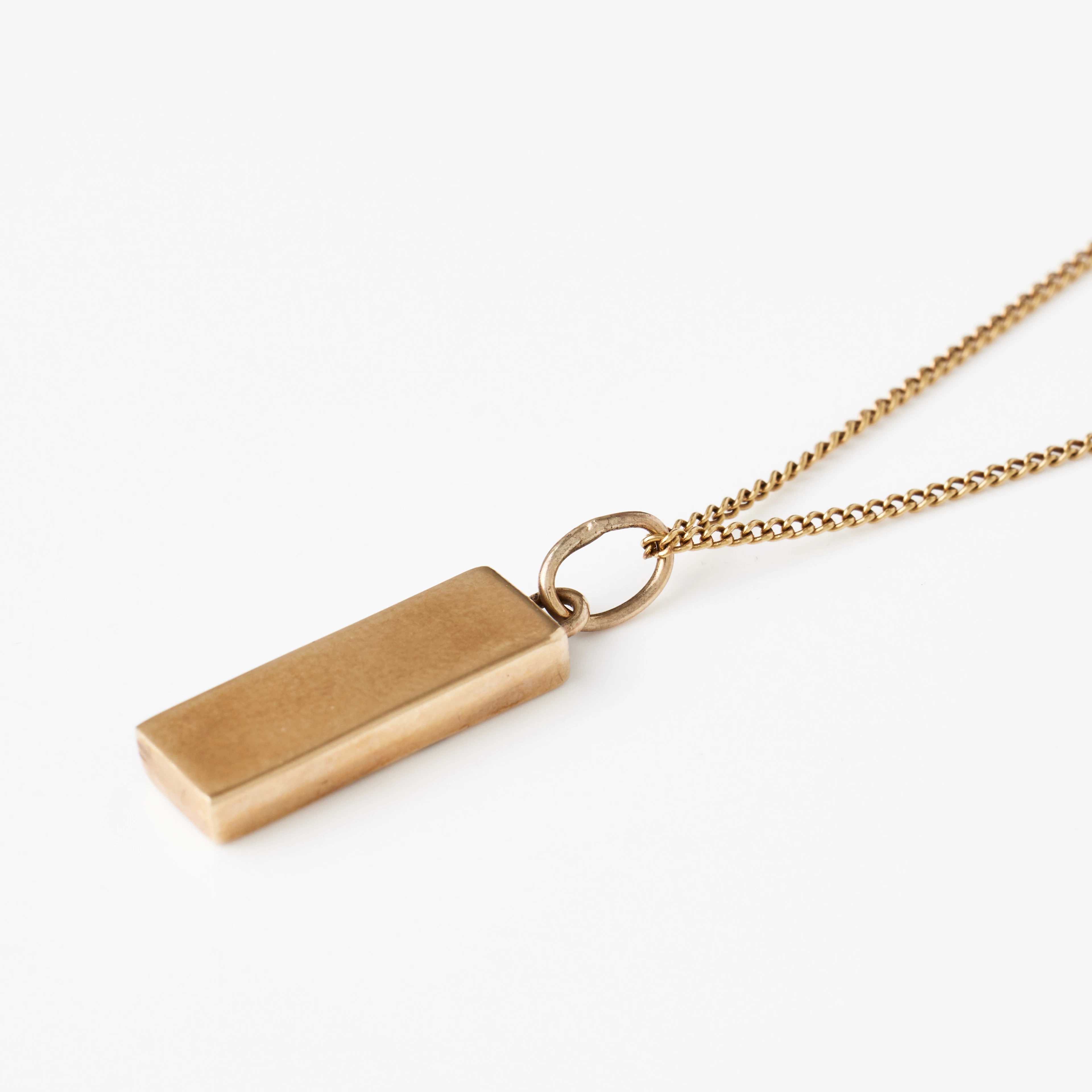 HÄNGE, 9 k guld, i form av en guldtacka, Apex Jewellery, Birmingham
