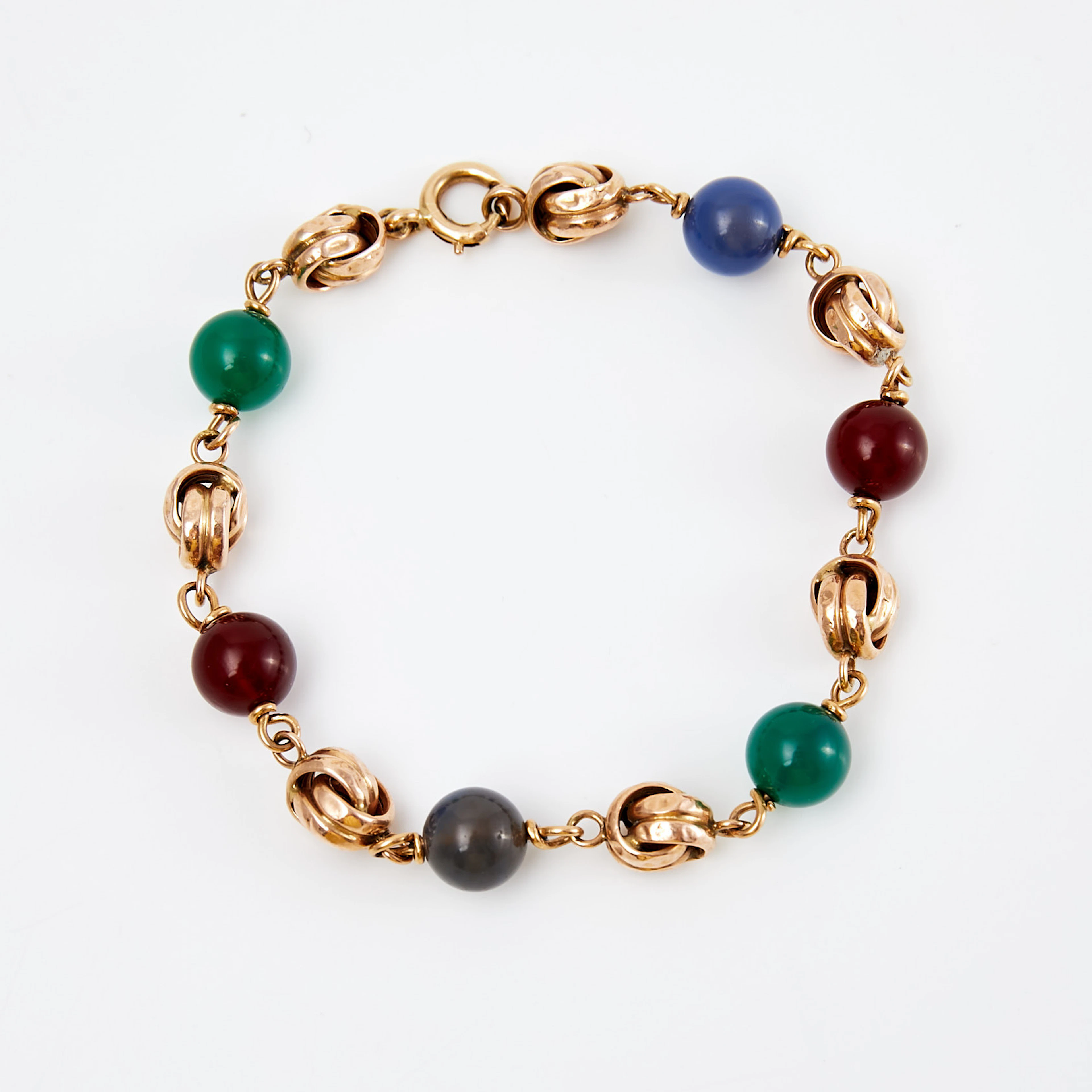 ARMBAND, 14 k guld, dekor av karneol, rökkvarts samt grön agat, otydliga