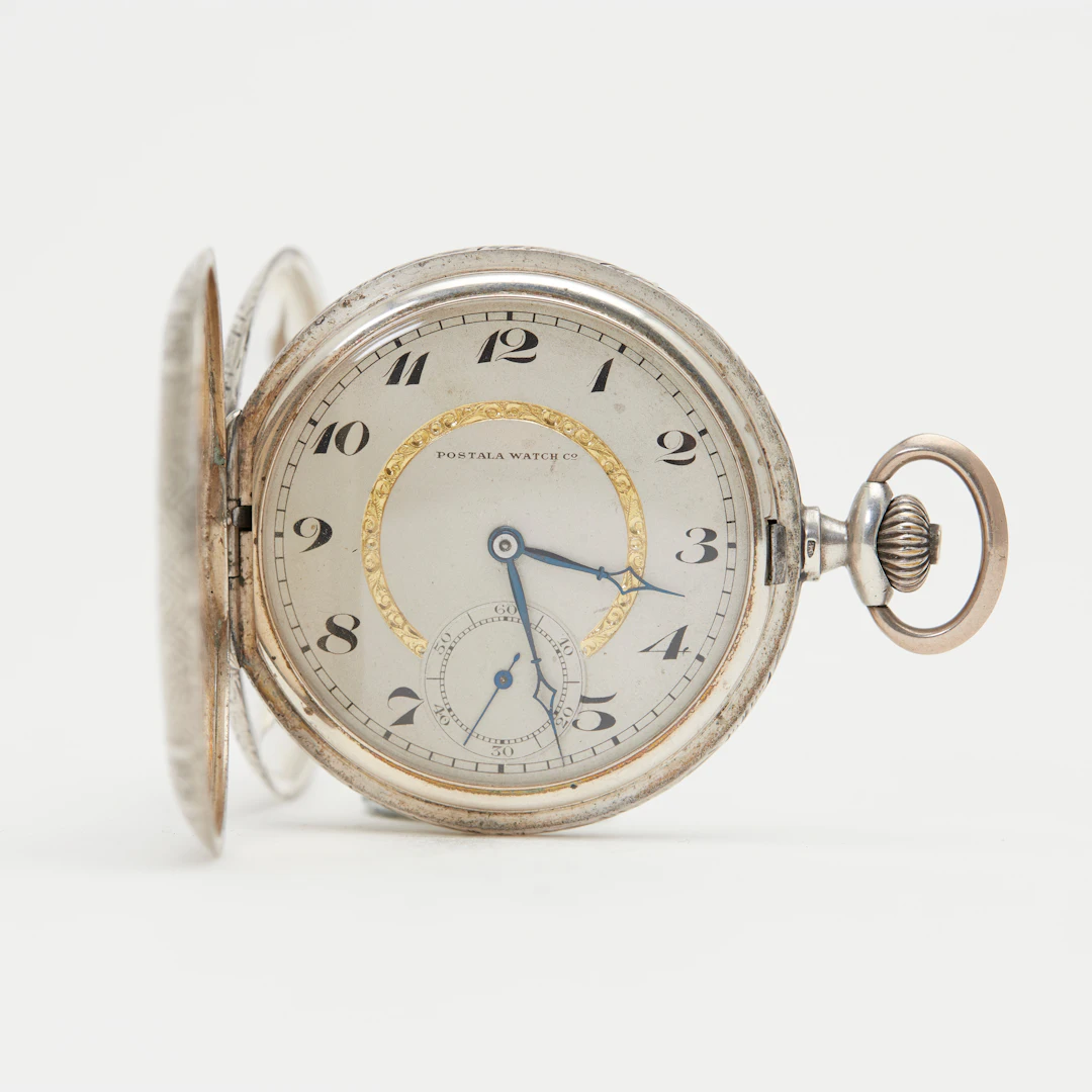 POSTALA WATCH CO. Savonnette Taschenuhr, 900er Silber.