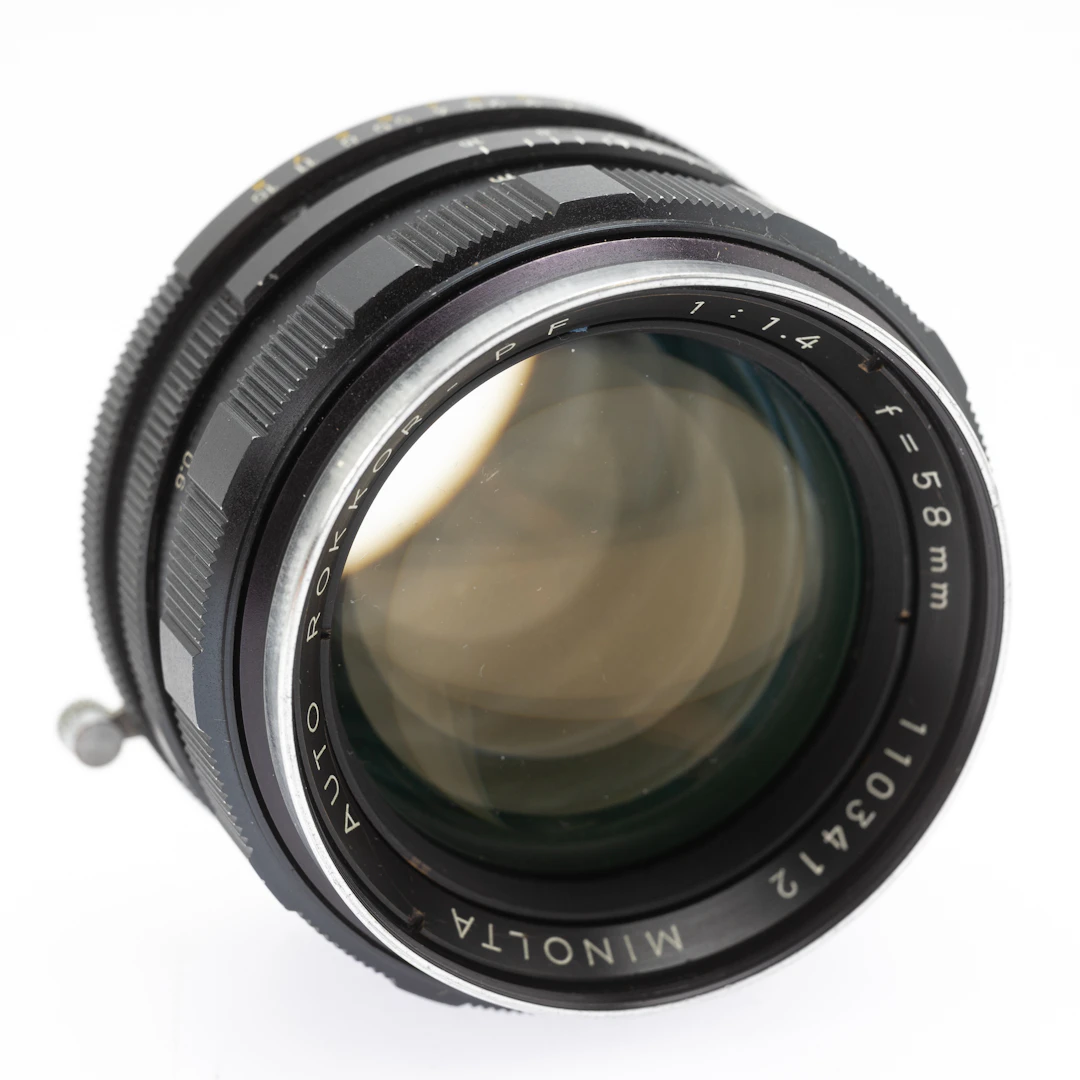 Minolta Auto Rokkor - PF 1:1,4 / 58mm (SN 1103412 ) Objektiv.