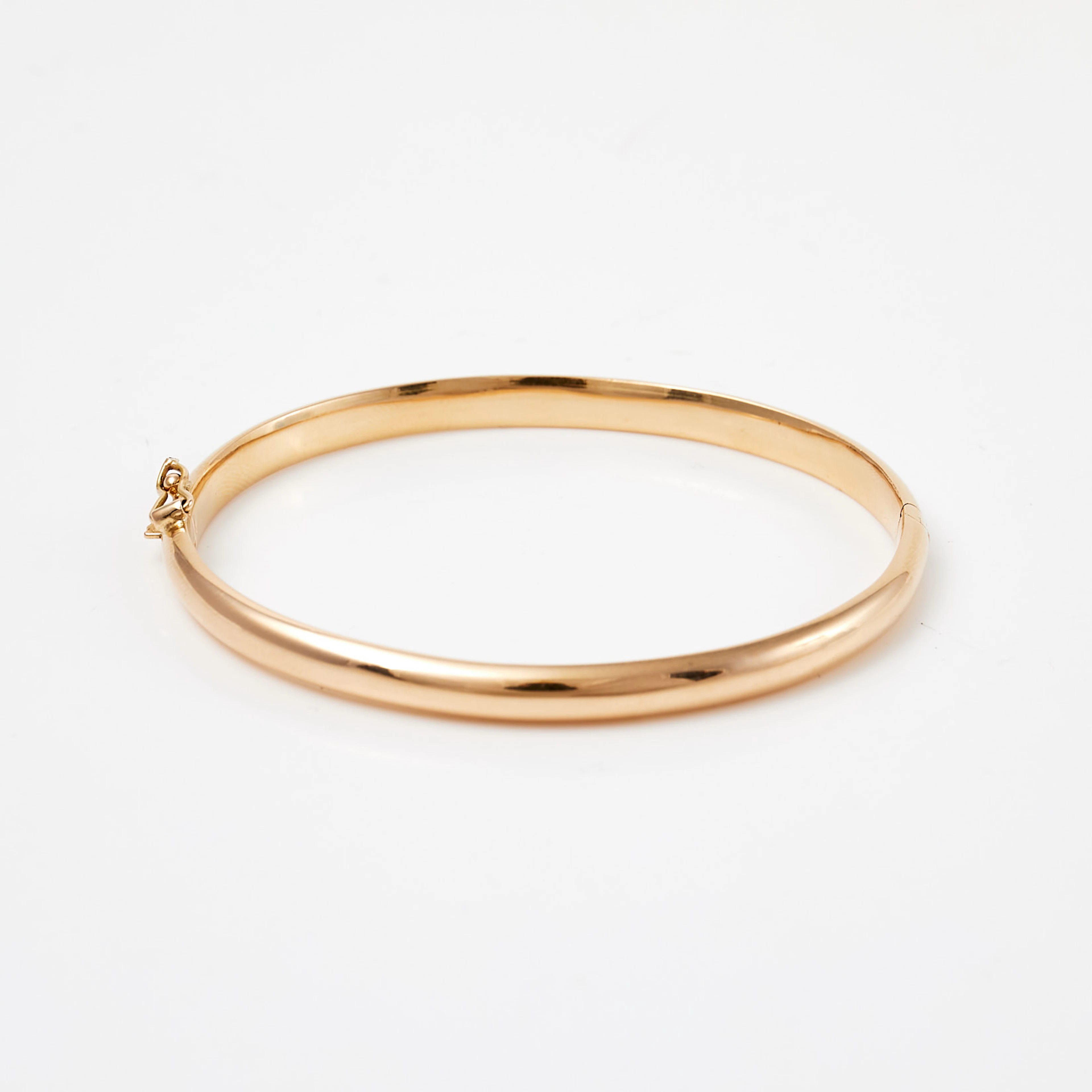 ARMRING. 18 k guld, stel modell, italienska stämplar.