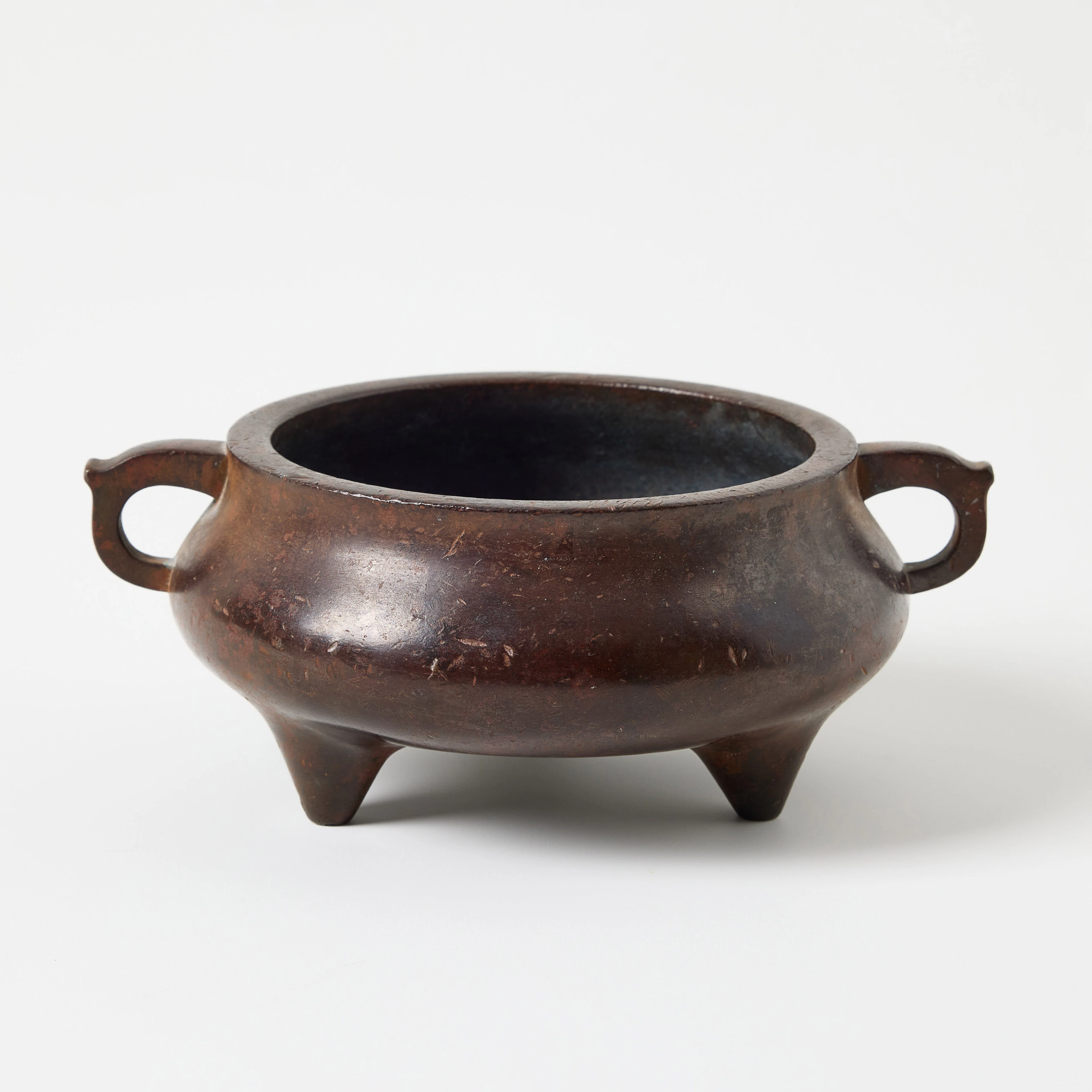 A Chinese Bronze Tripod Censer.