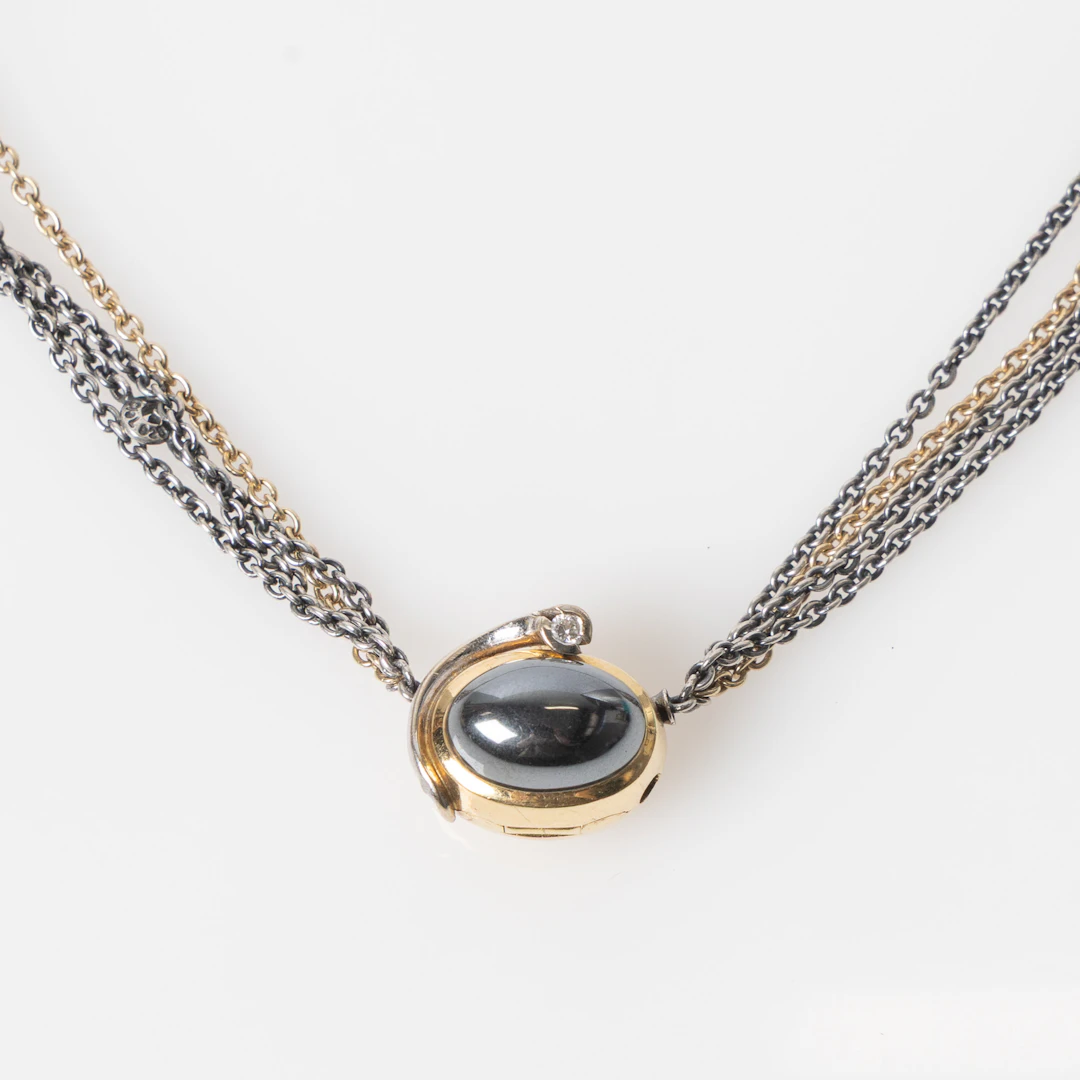 OLE LYNGGAARD, collier i 18K guld och oxiderat silver med lås i 18K