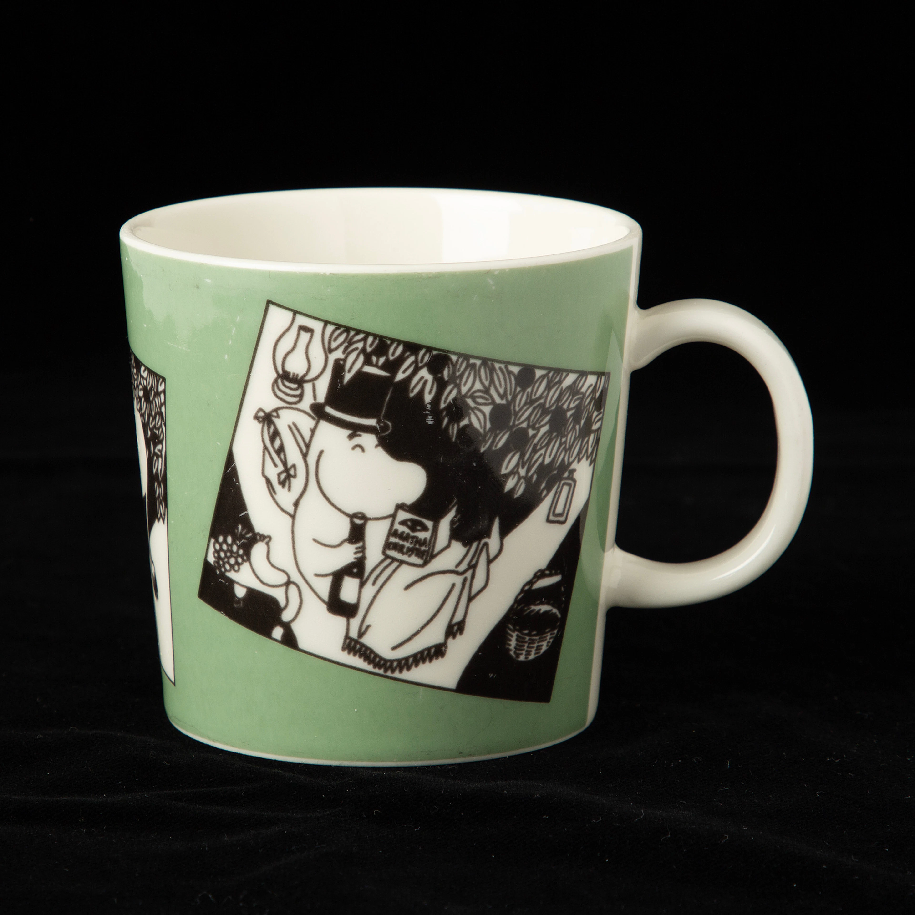 MUMINMUGG ."Mugg Grön", porslin, Arabia, Finland, 1990-93.